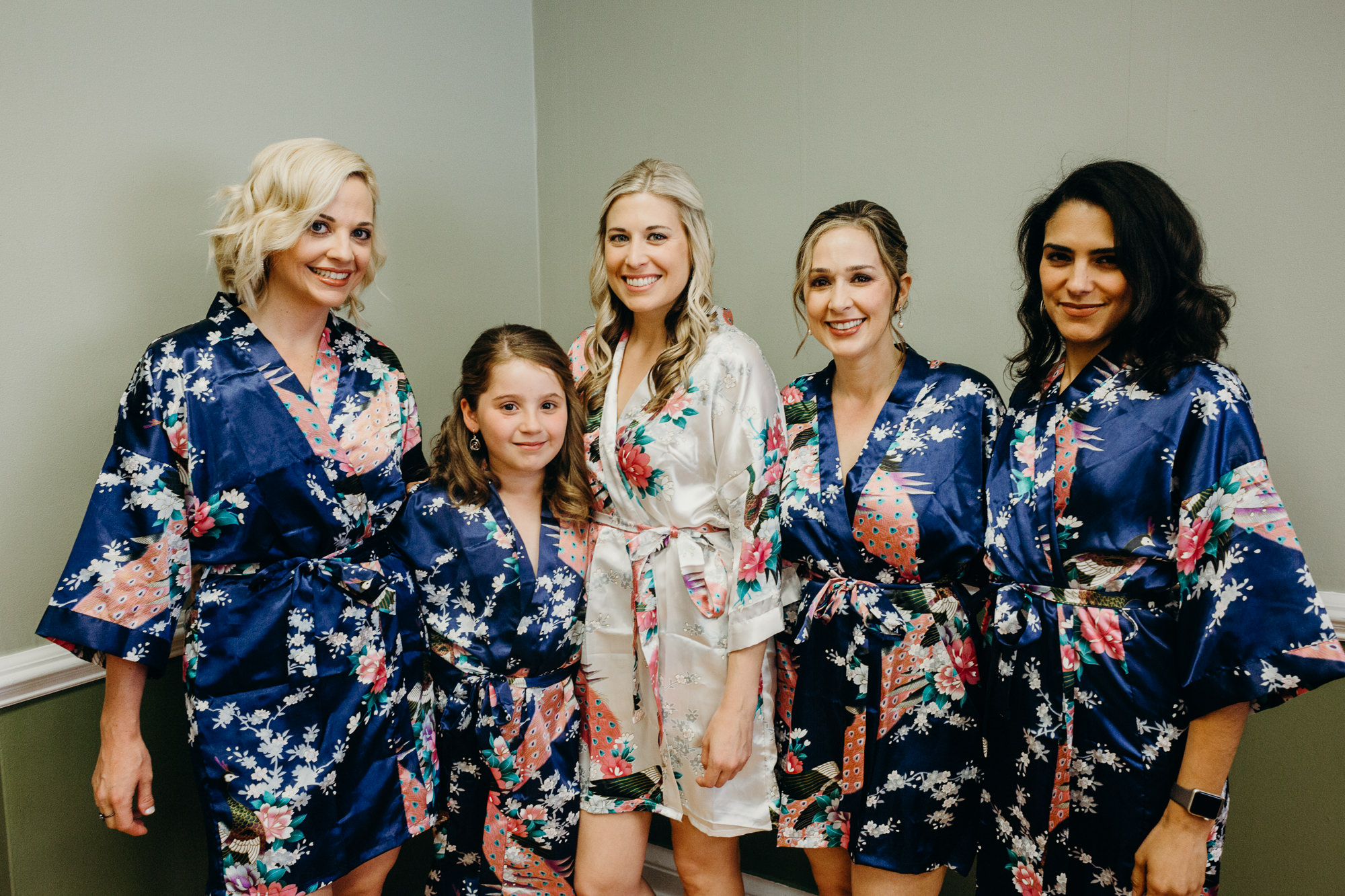 a bride and her bridesmaids at the upper montclair country club in montclair, new jersey
