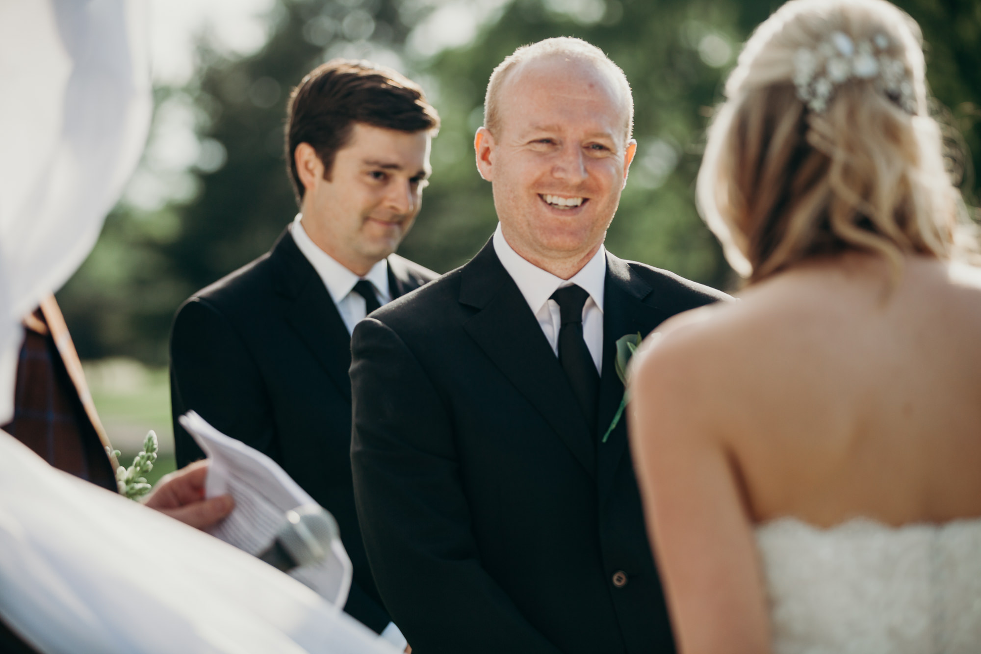 a groom during his wedding ceremony at the upper montclair country club in montclair, new jersey
