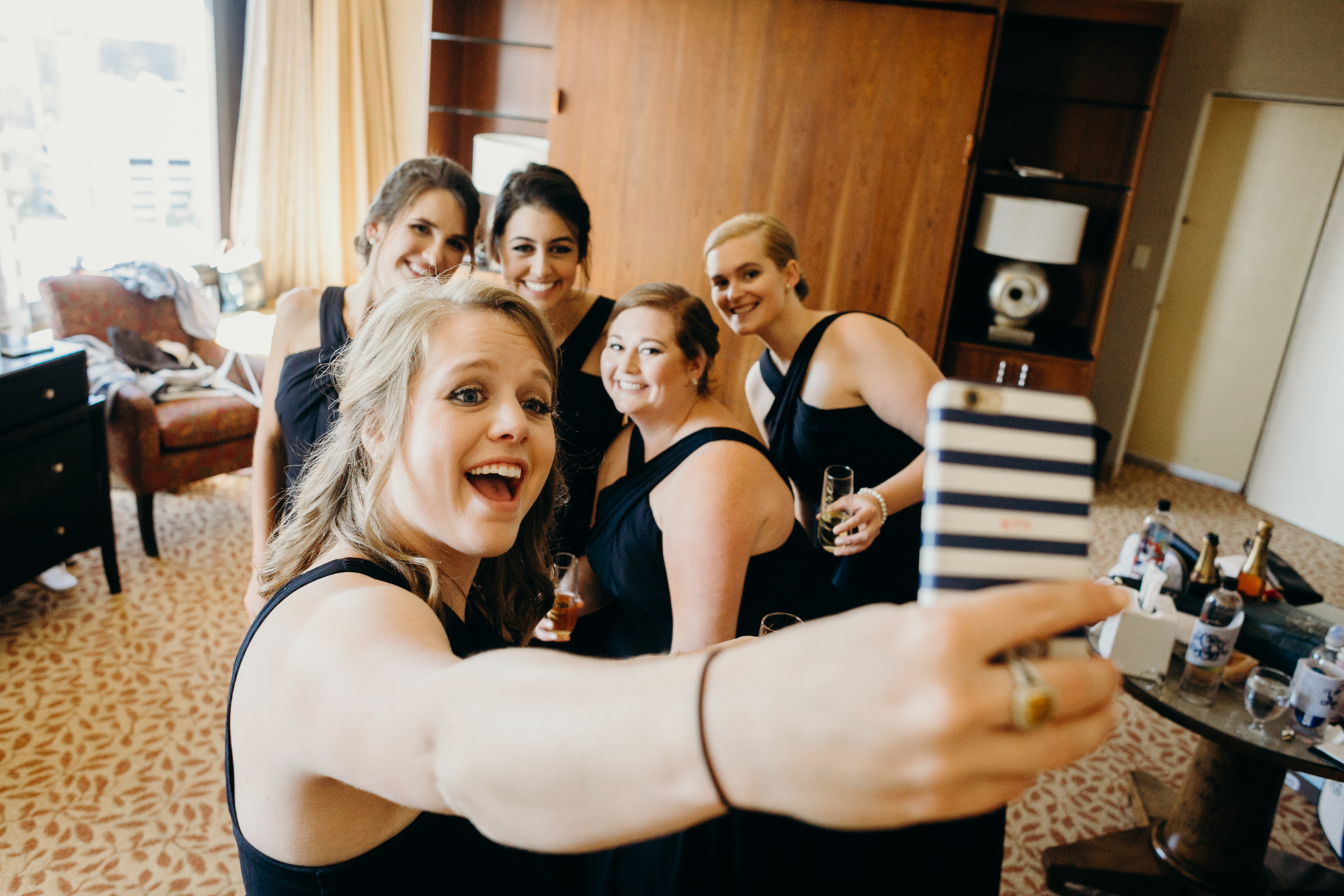 bridesmaids taking a selfie at country club of darien in darien, connecticut