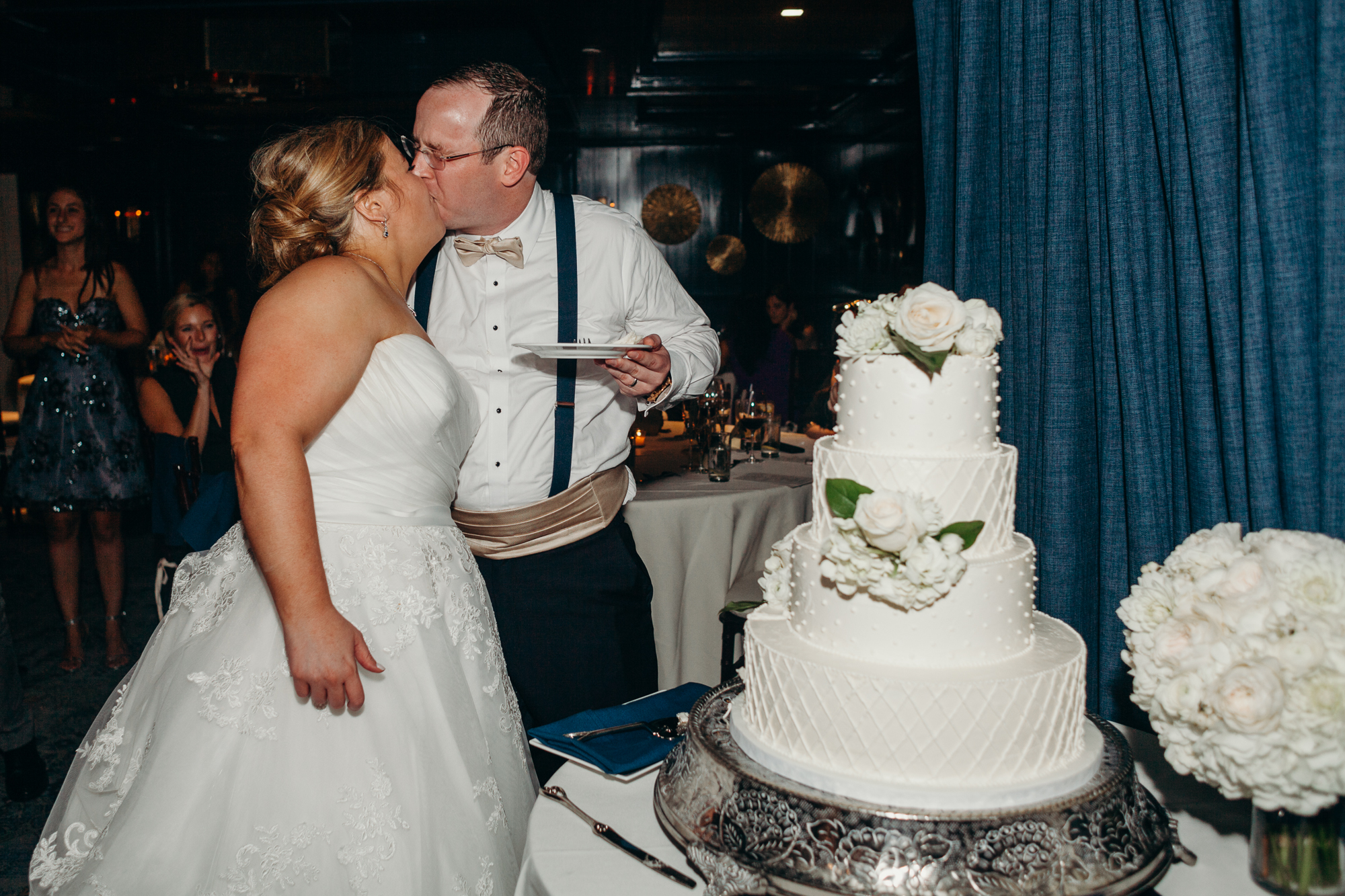 wedding couple cutting their cake at country club of darien in darien, connecticut