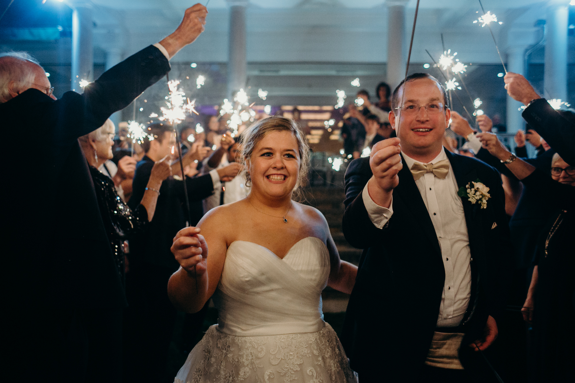 bride and groom during a sparker exit at country club of darien in darien, connecticut
