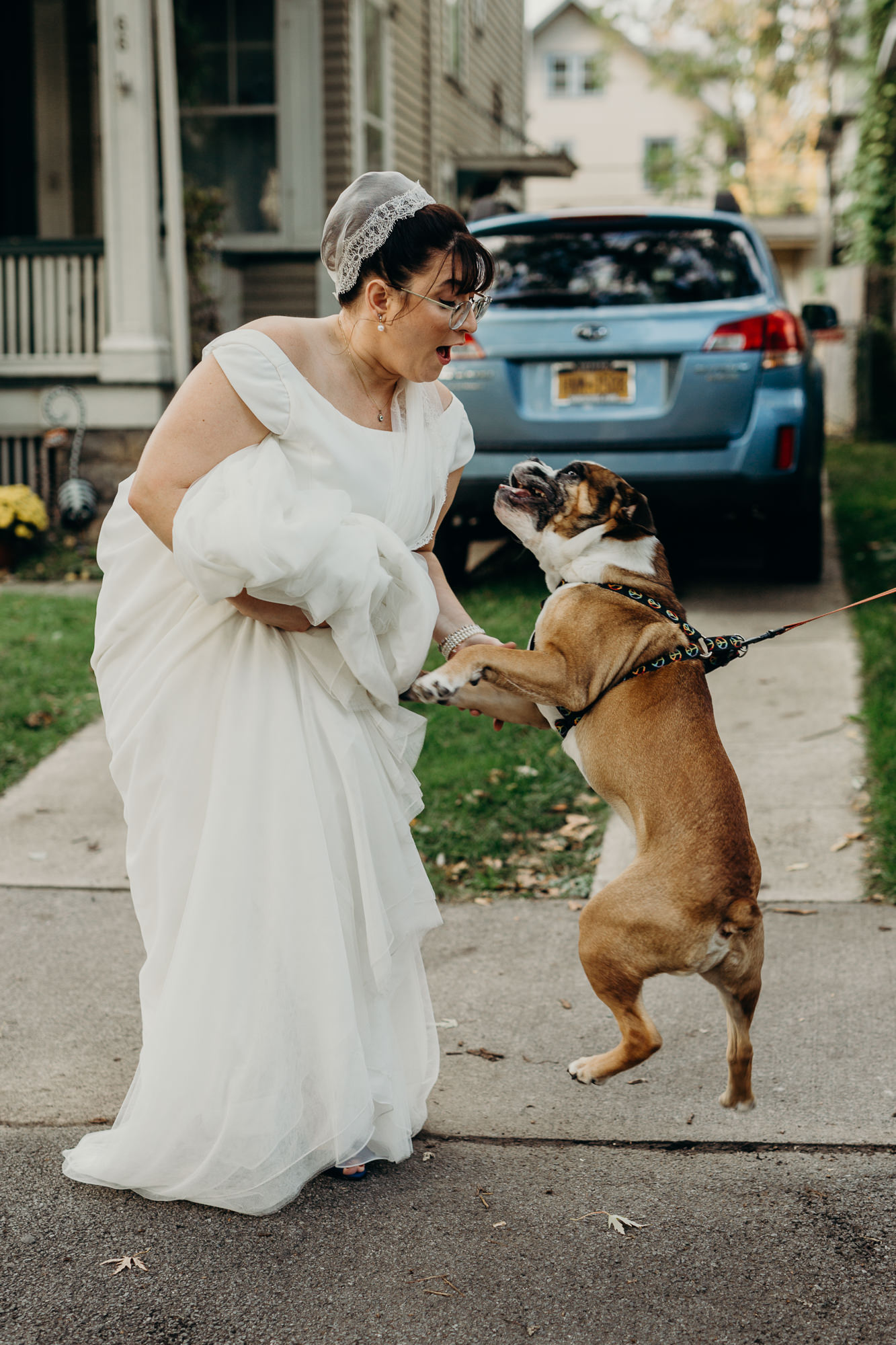 a portrait of a bride and her dog in rochester, new york