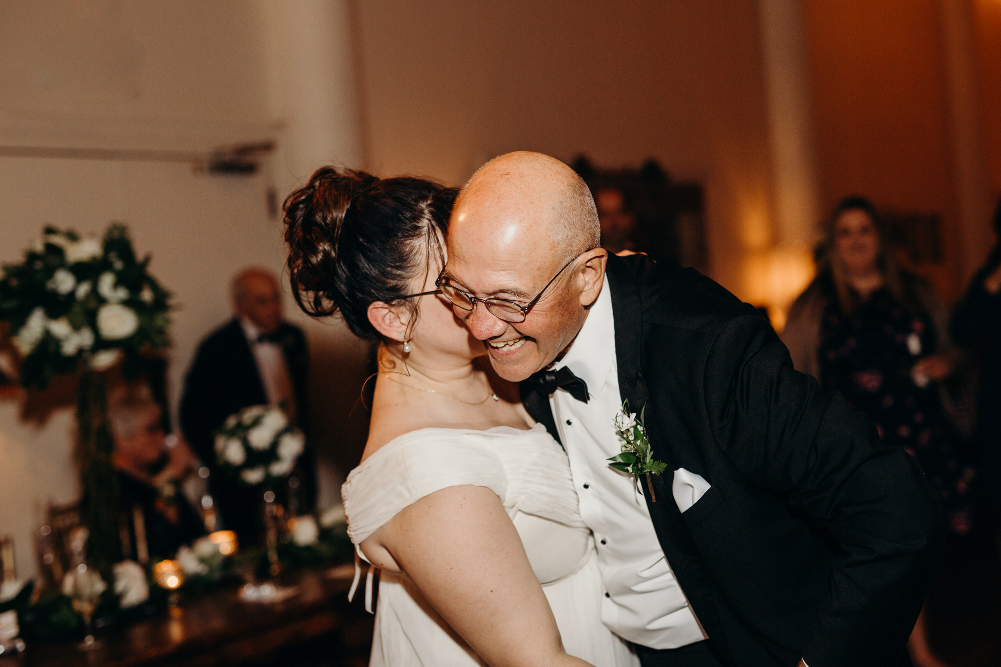 a bride dances with her father during her wedding reception at studio in rochester, ny