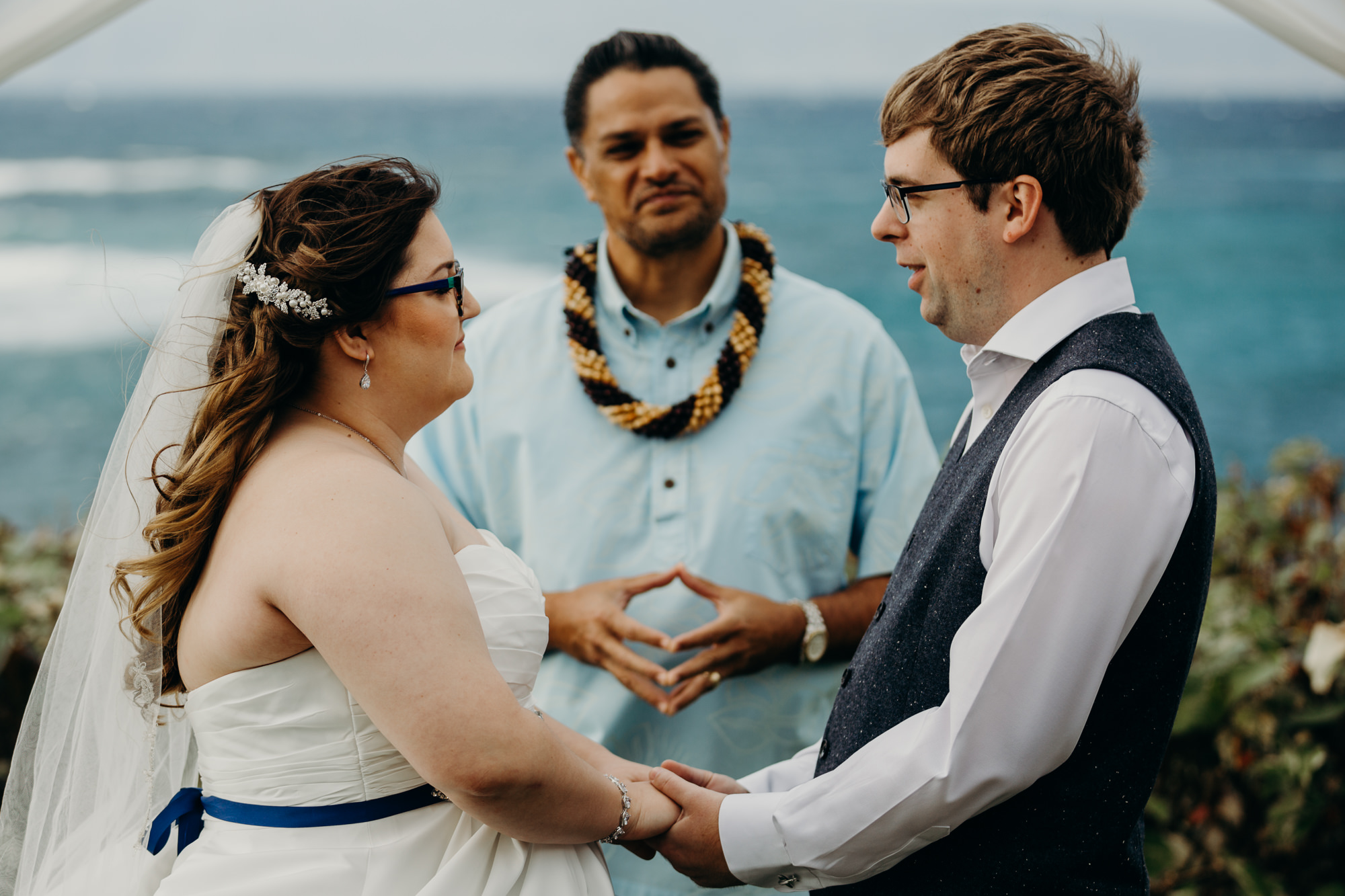 bride and groom at their wedding ceremony at merriman's maui in kaanapali, HI