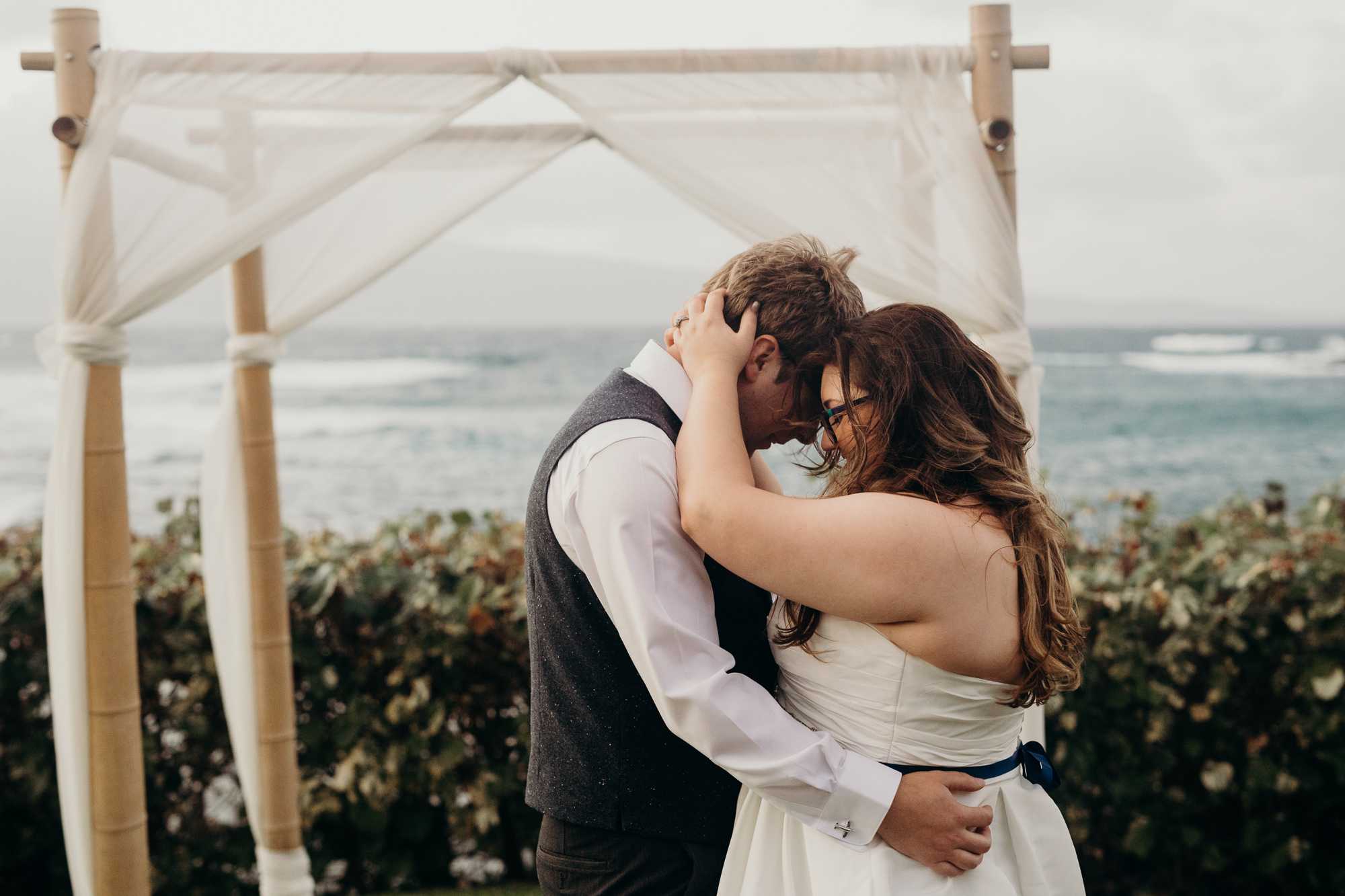 bride and groom share their first dance at merriman's maui in maui, HI