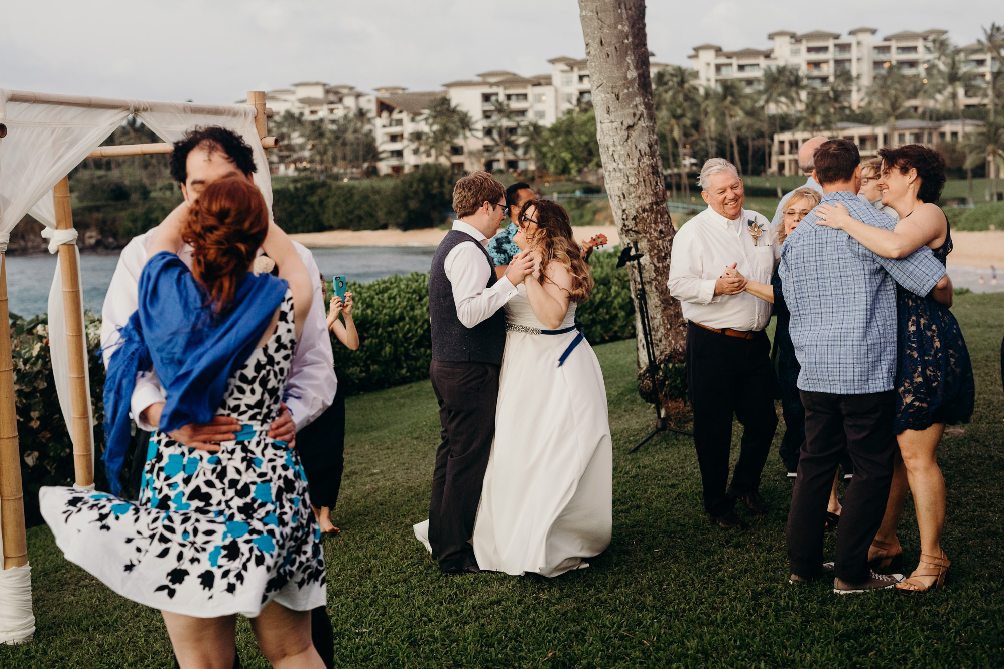 bride and groom share their first dance at merriman's maui in maui, HI
