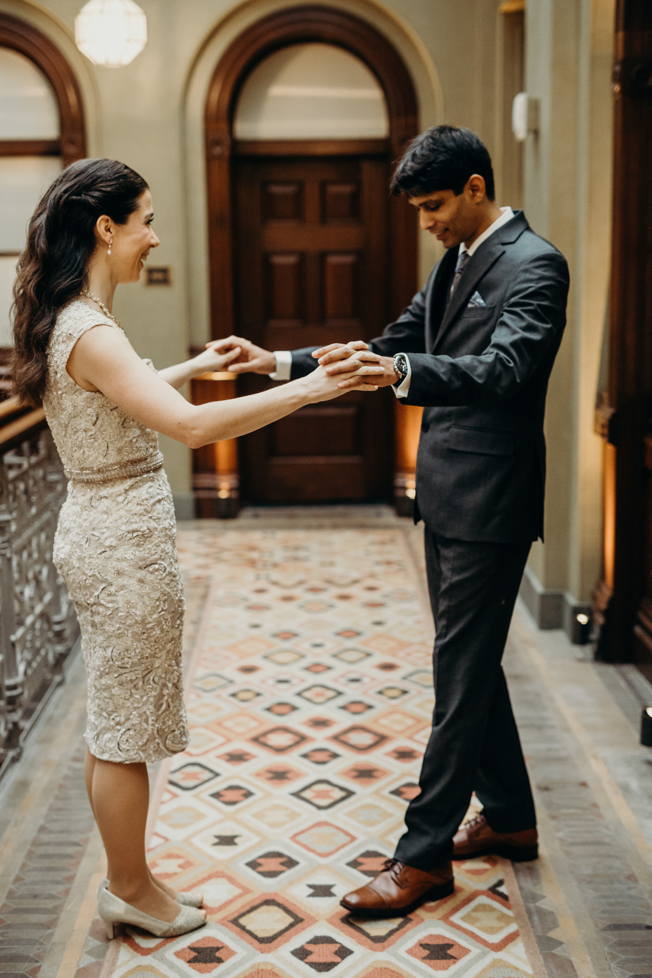 bride and groom share a first look at the beekman hotel in new york city, ny