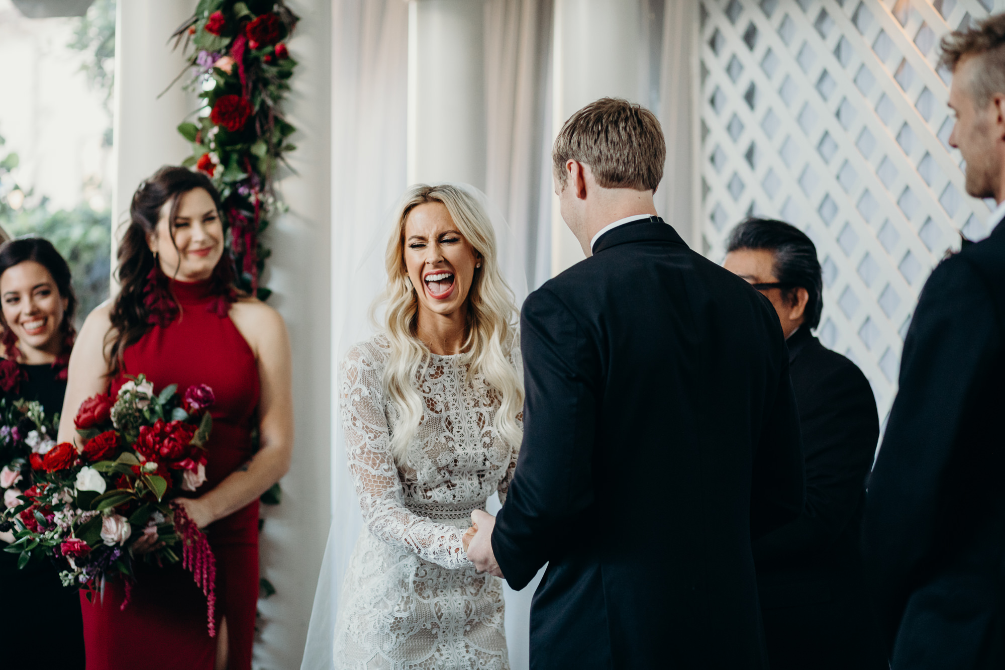 bride laughs during wedding ceremony at five crowns in newport beach, CA