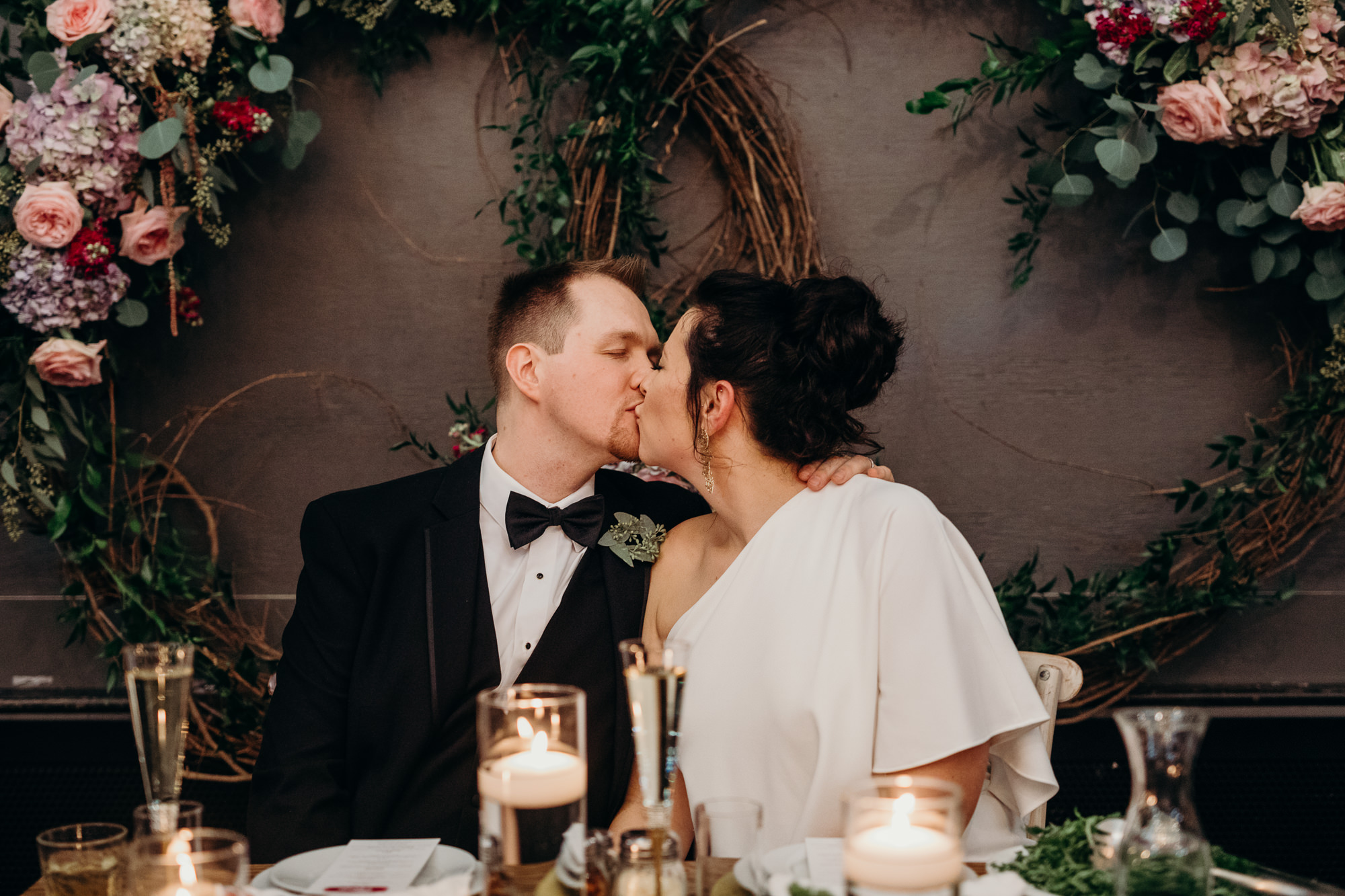 bride and groom kiss at their reception at porta in asbury park, NJ