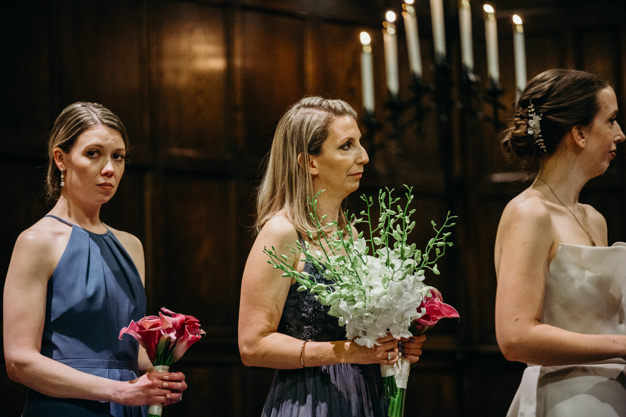 bridesmaid during a wedding ceremony at church in new york city, ny