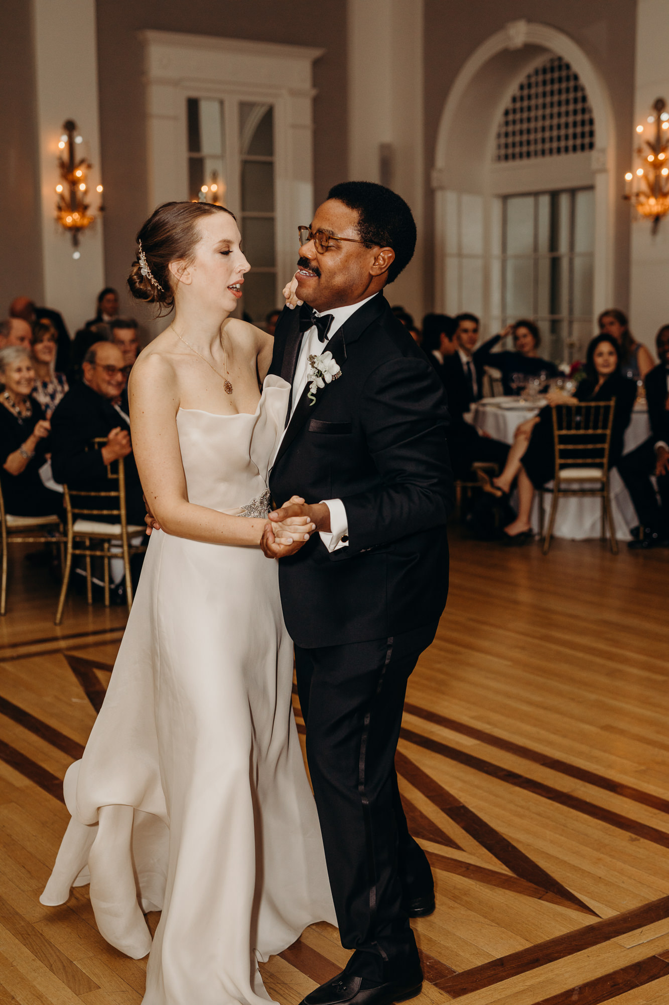 bride and groom with their first dance at cosmopolitan club in new york city, ny