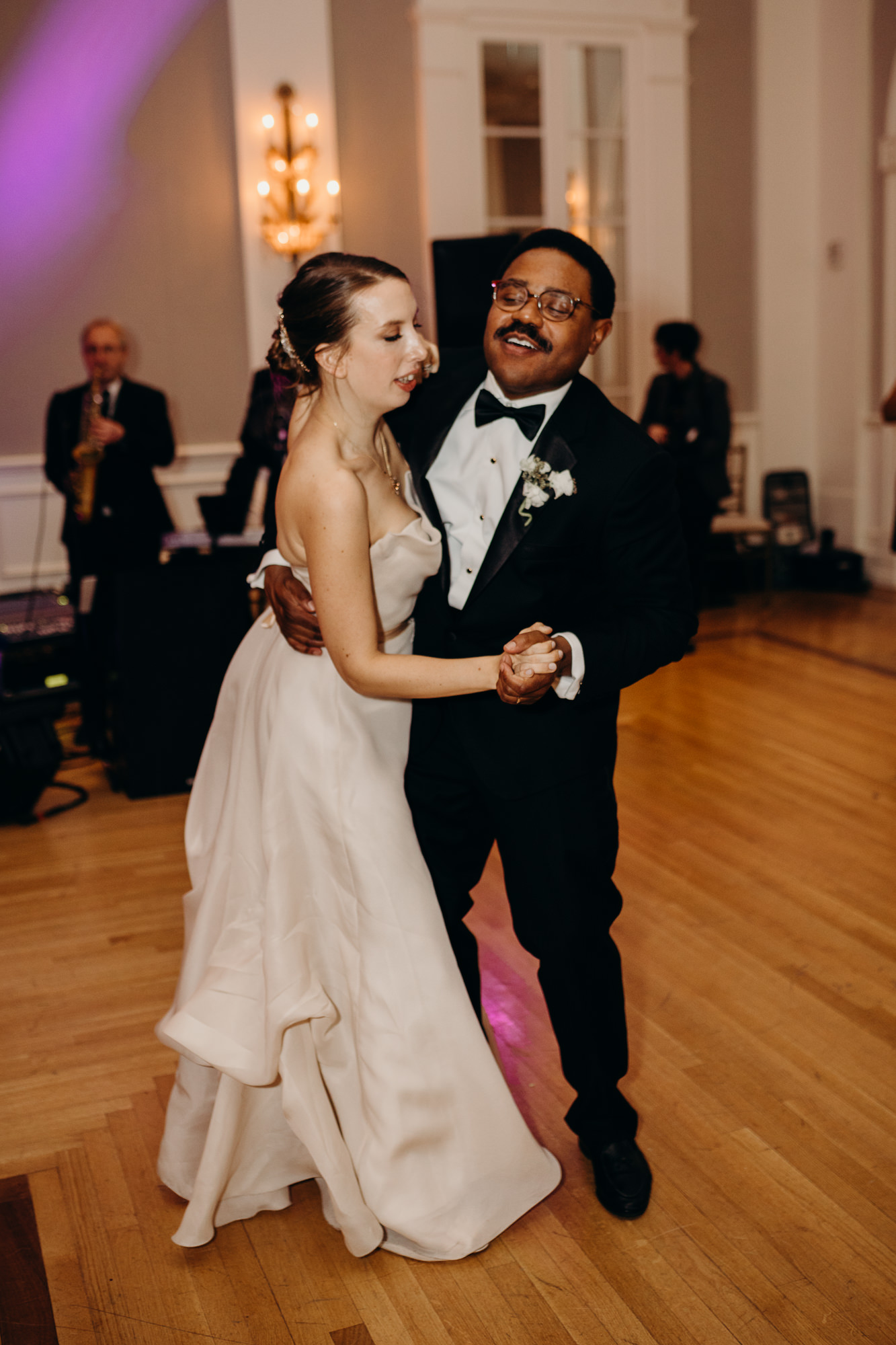 bride and groom with their first dance at cosmopolitan club in new york city, ny