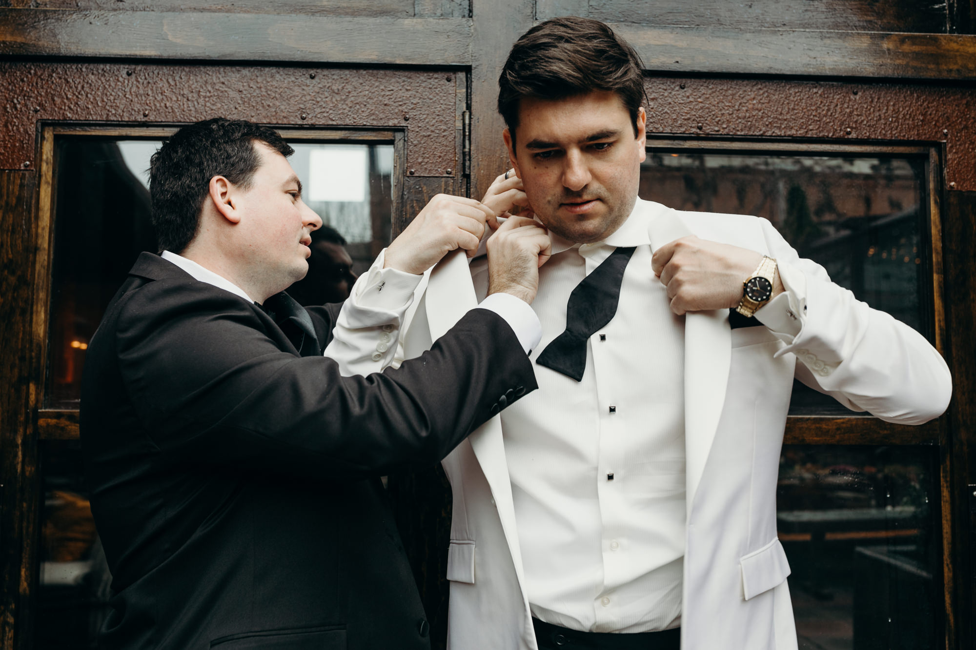 groom getting ready for his wedding at mymoon in brooklyn, new york