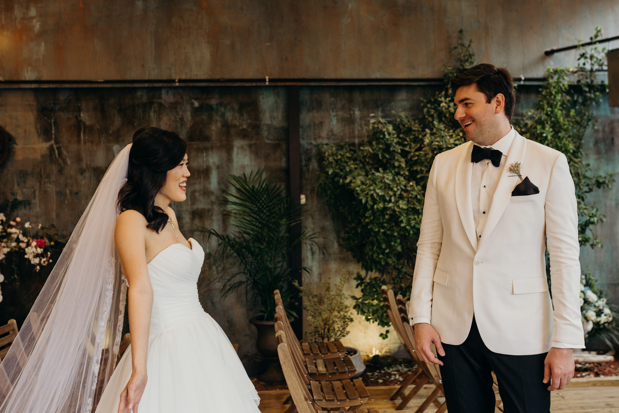 bride and groom share a first look at mymoon in brooklyn, new york