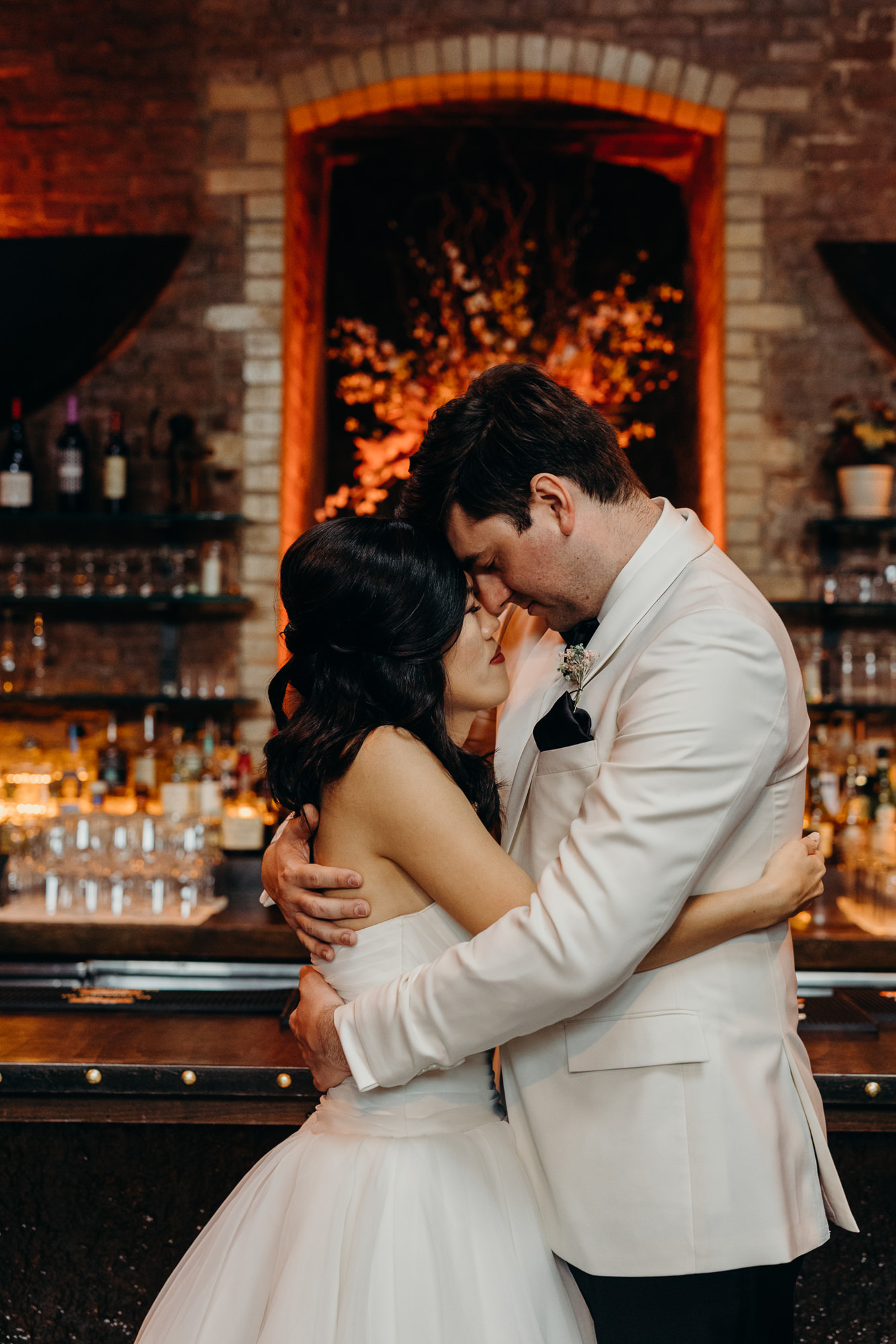 a portrait of a bride and groom at mymoon in brooklyn, new york