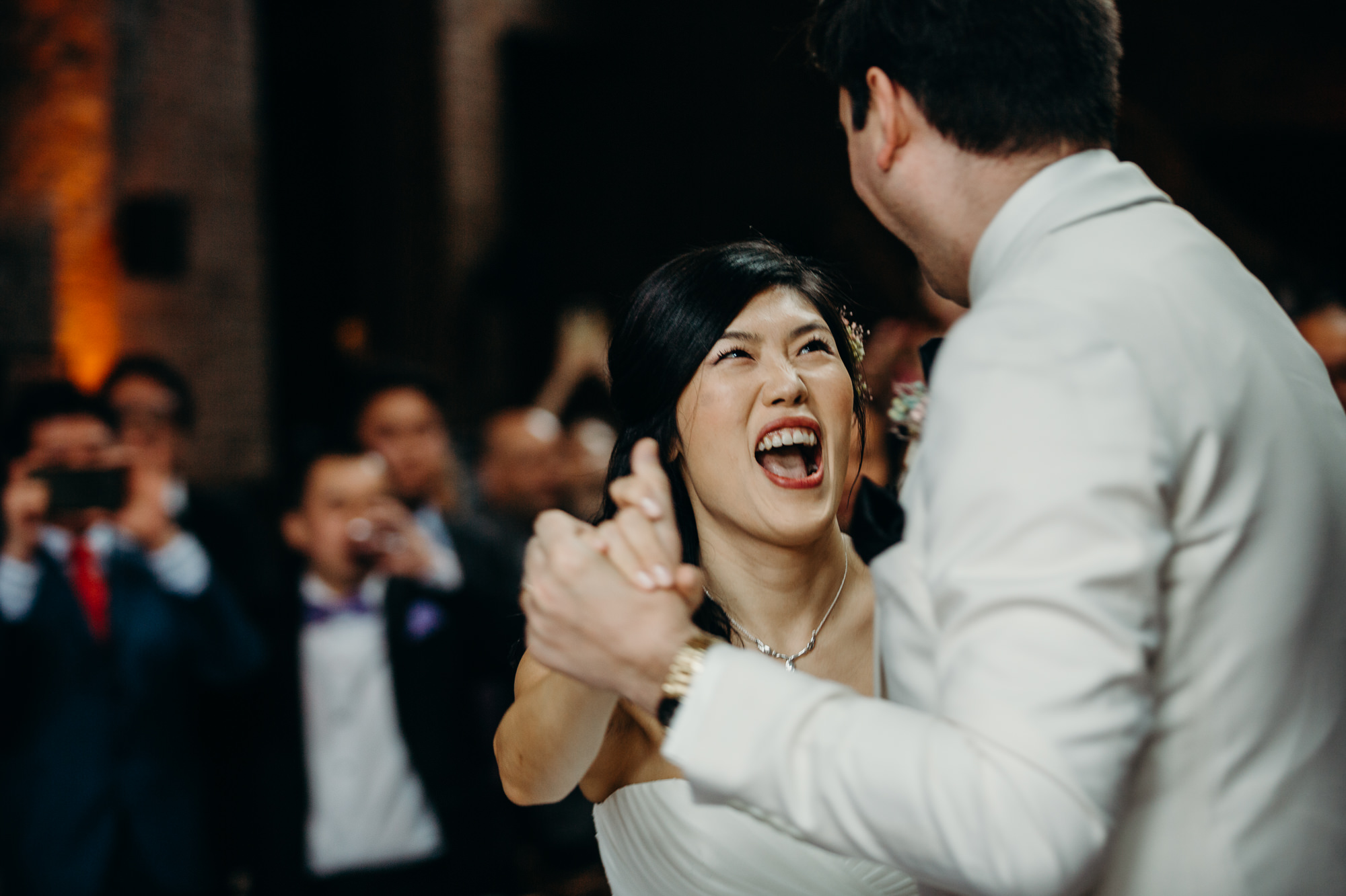 bride laughs at her husband at mymoon in brooklyn, new york