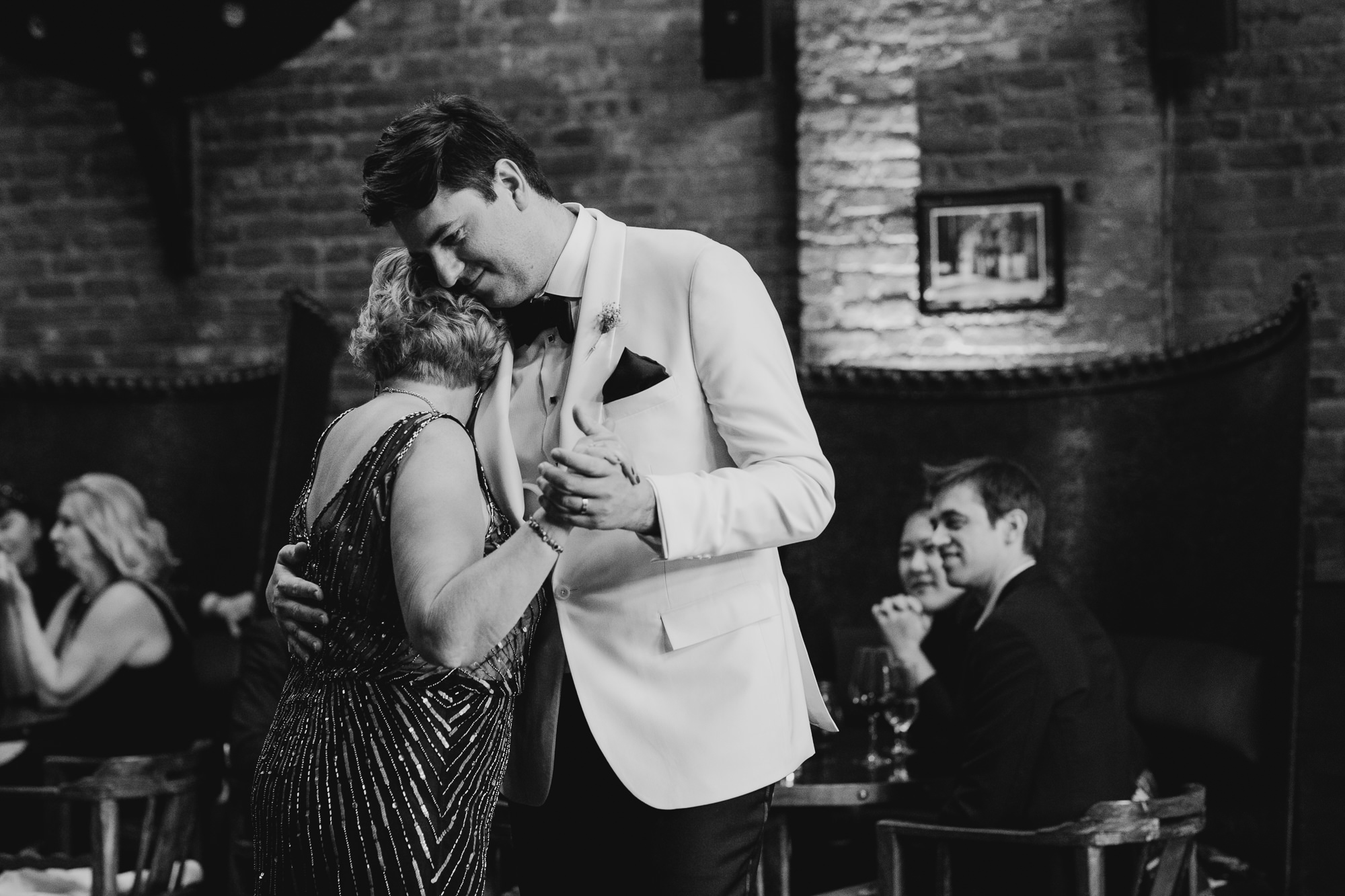 groom dances with his mother at mymoon in brooklyn, new york