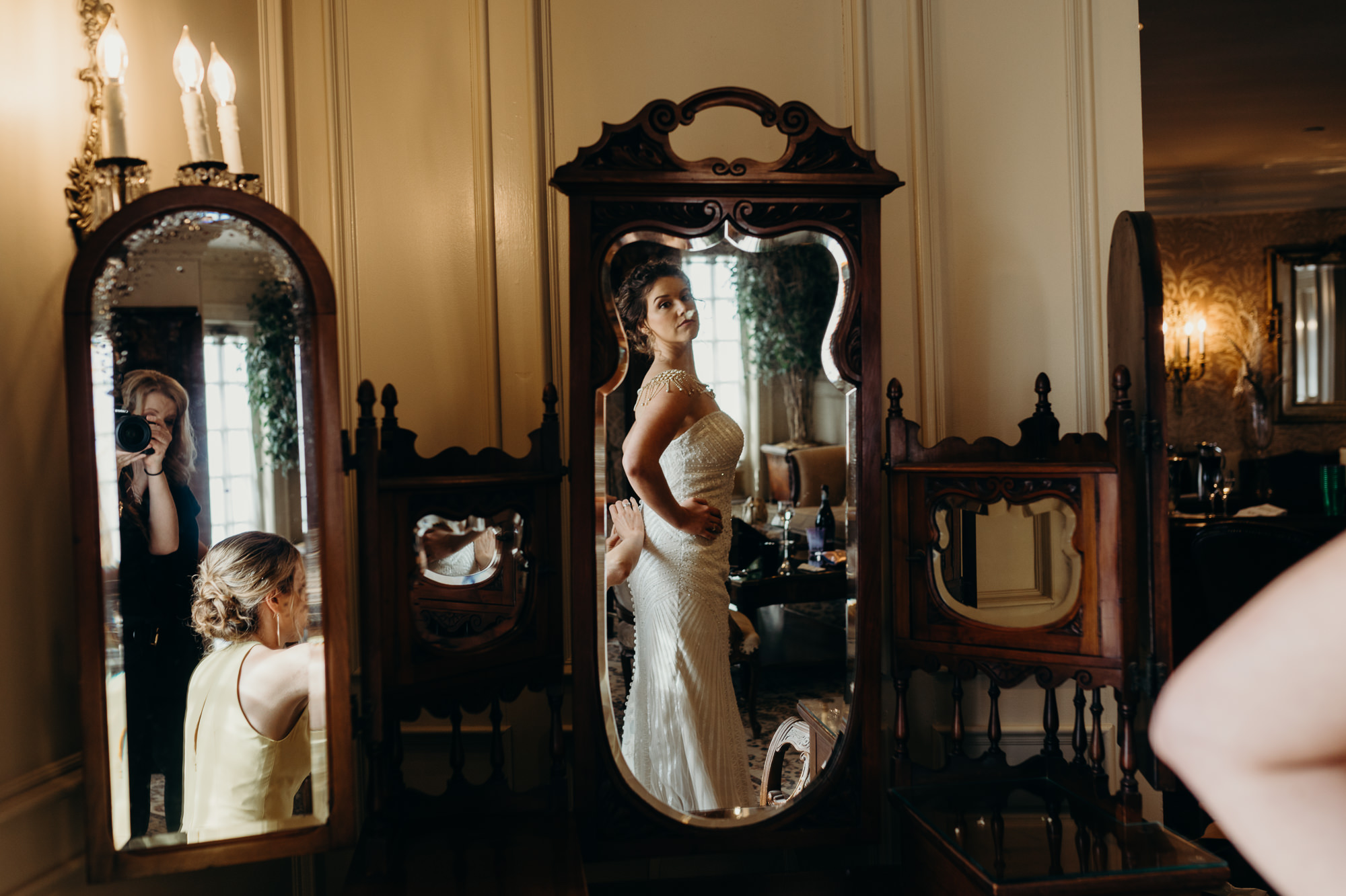 bride getting ready for her wedding at the park savoy in florham park, new jersey