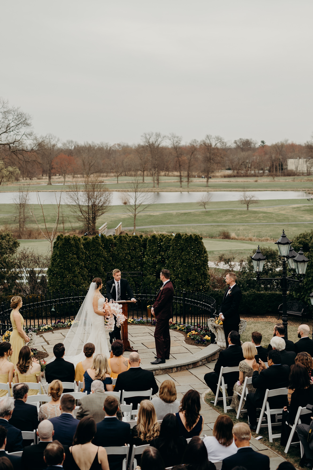 bride and groom during their wedding ceremony at the park savoy in florham park, new jersey