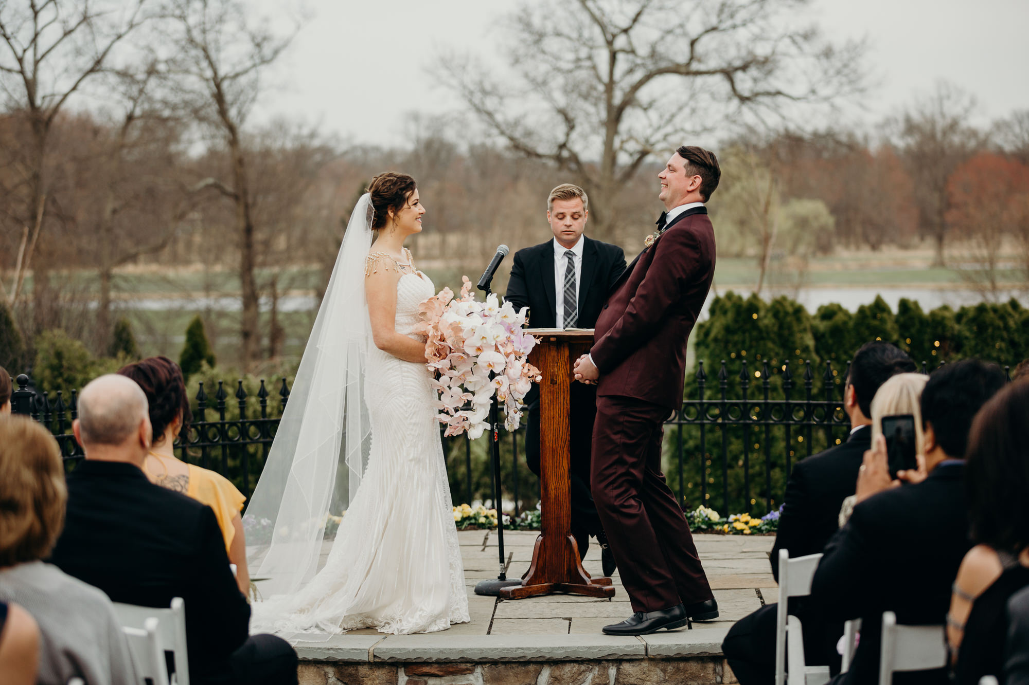 bride and groom during their wedding ceremony at the park savoy in florham park, new jersey