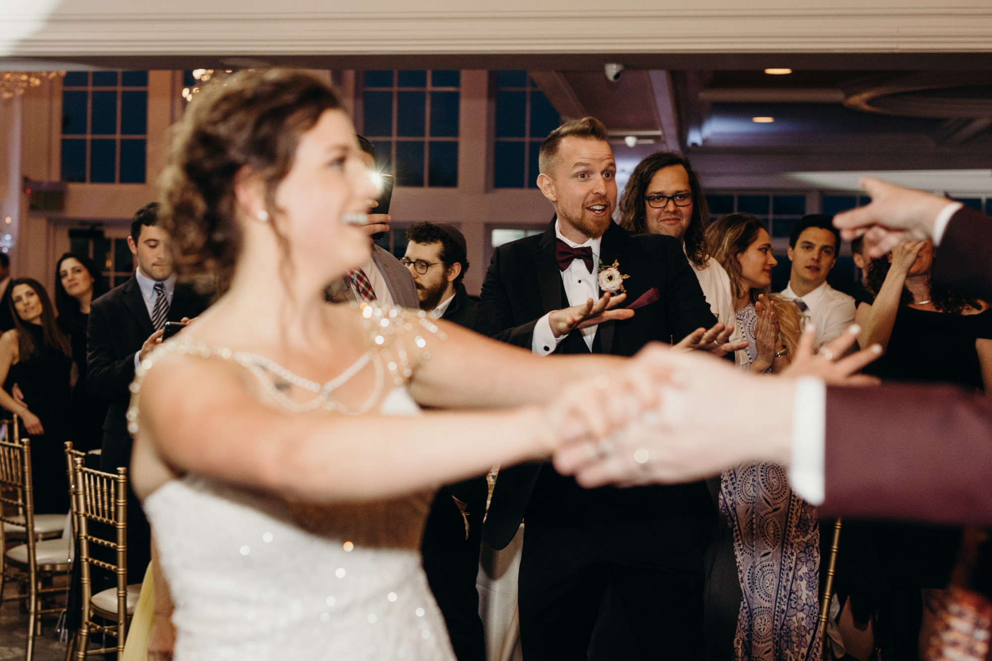 a bride and groom share a first dance at the park savoy in florham park, new jersey