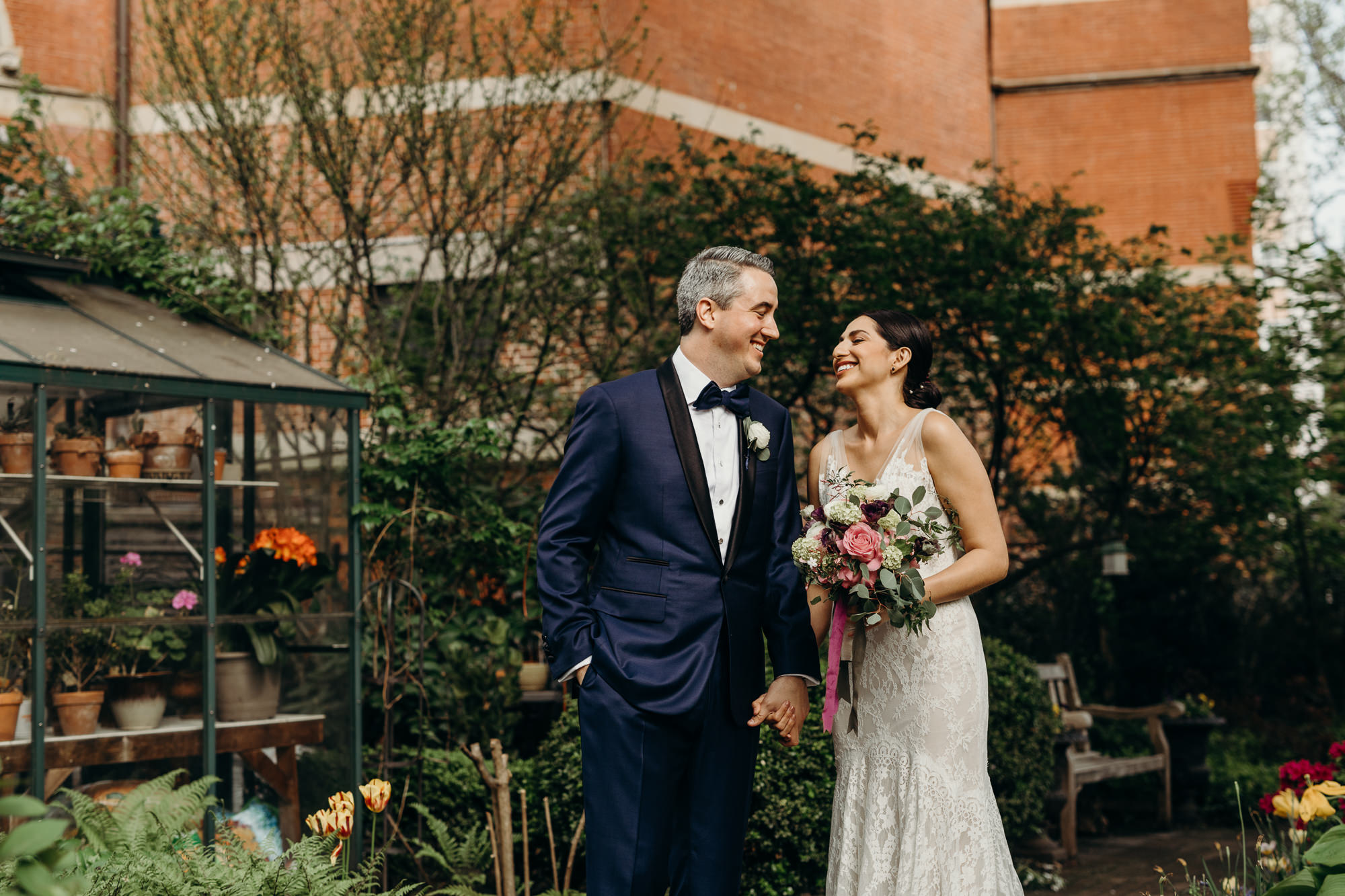 a portrait of a bride and groom at jefferson market garden in the west village, new york city