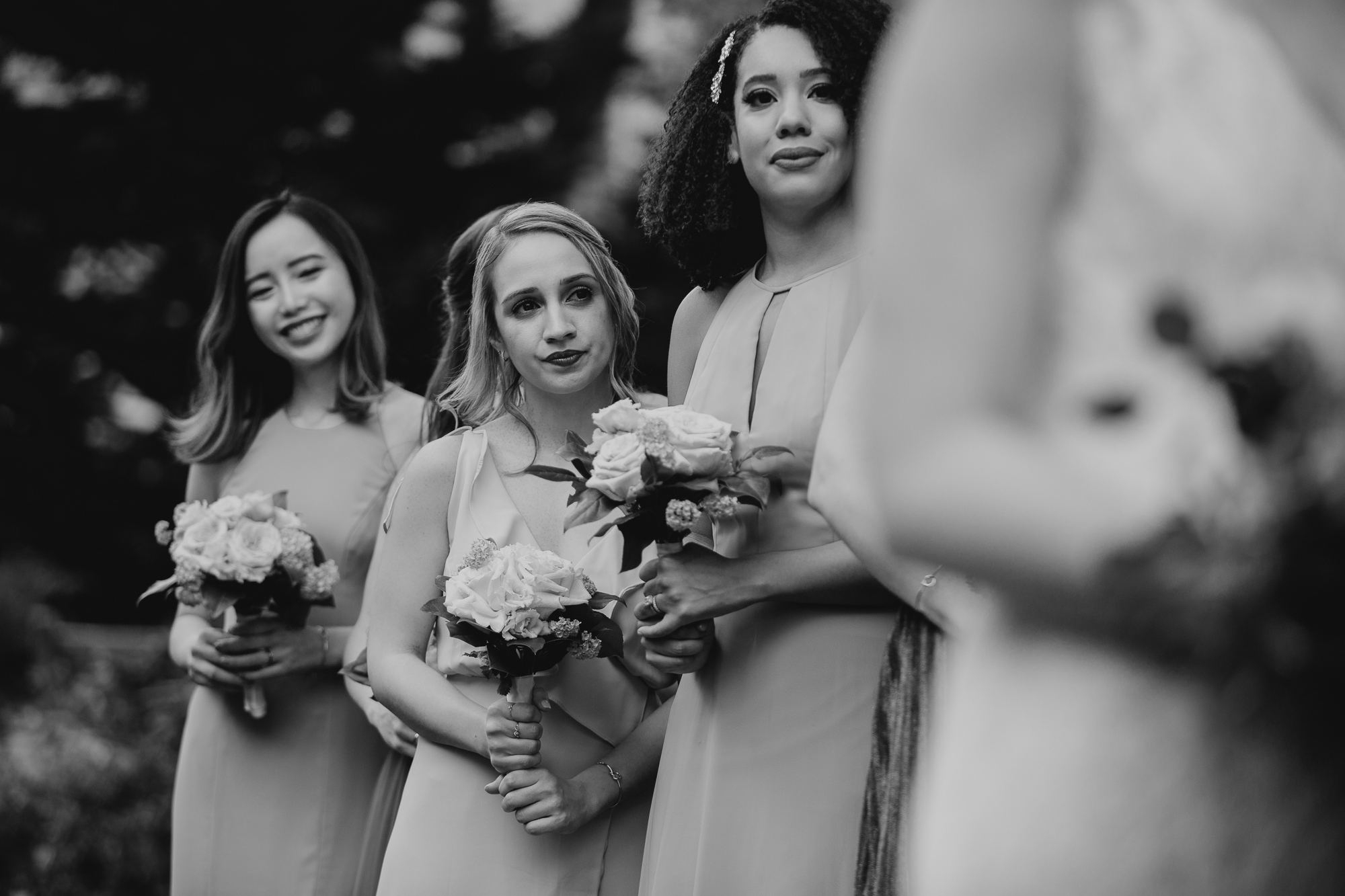 bridesmaids at a wedding at jefferson market garden in the west village, new york city