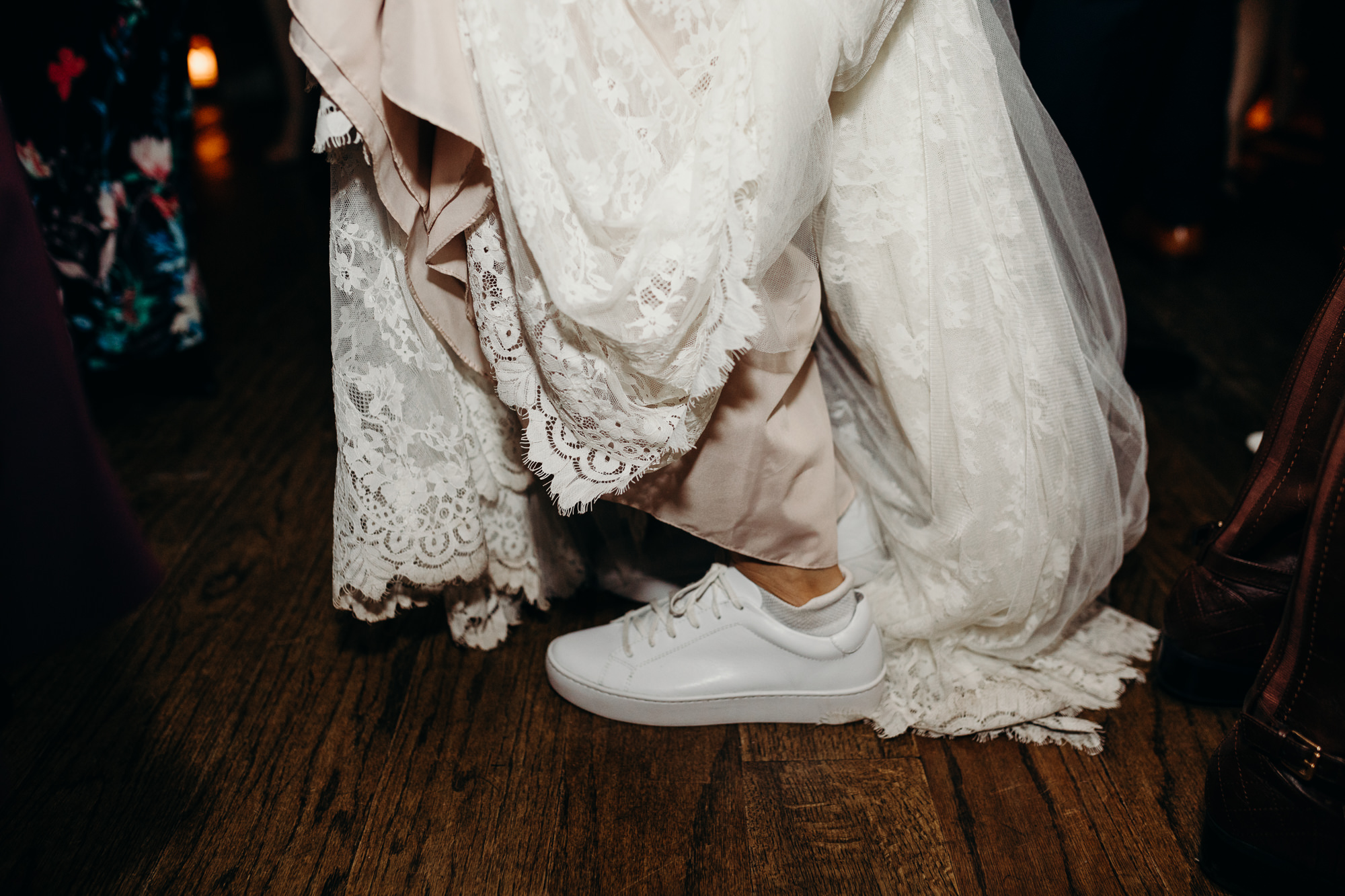 the brides sneakers at a wedding at bobo in the west village, new york city
