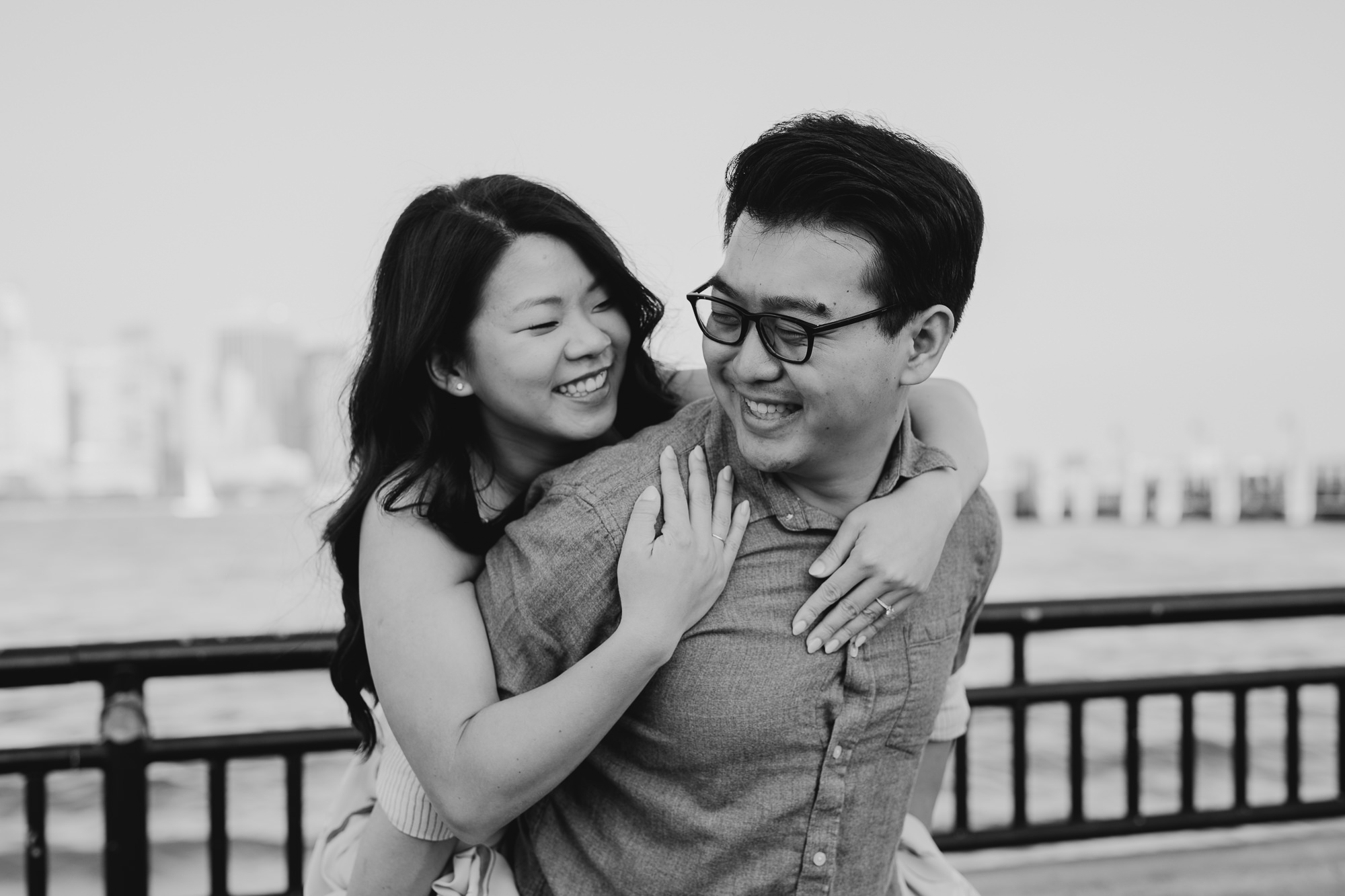 a portrait of a couple at liberty state park in jersey city, new jersey