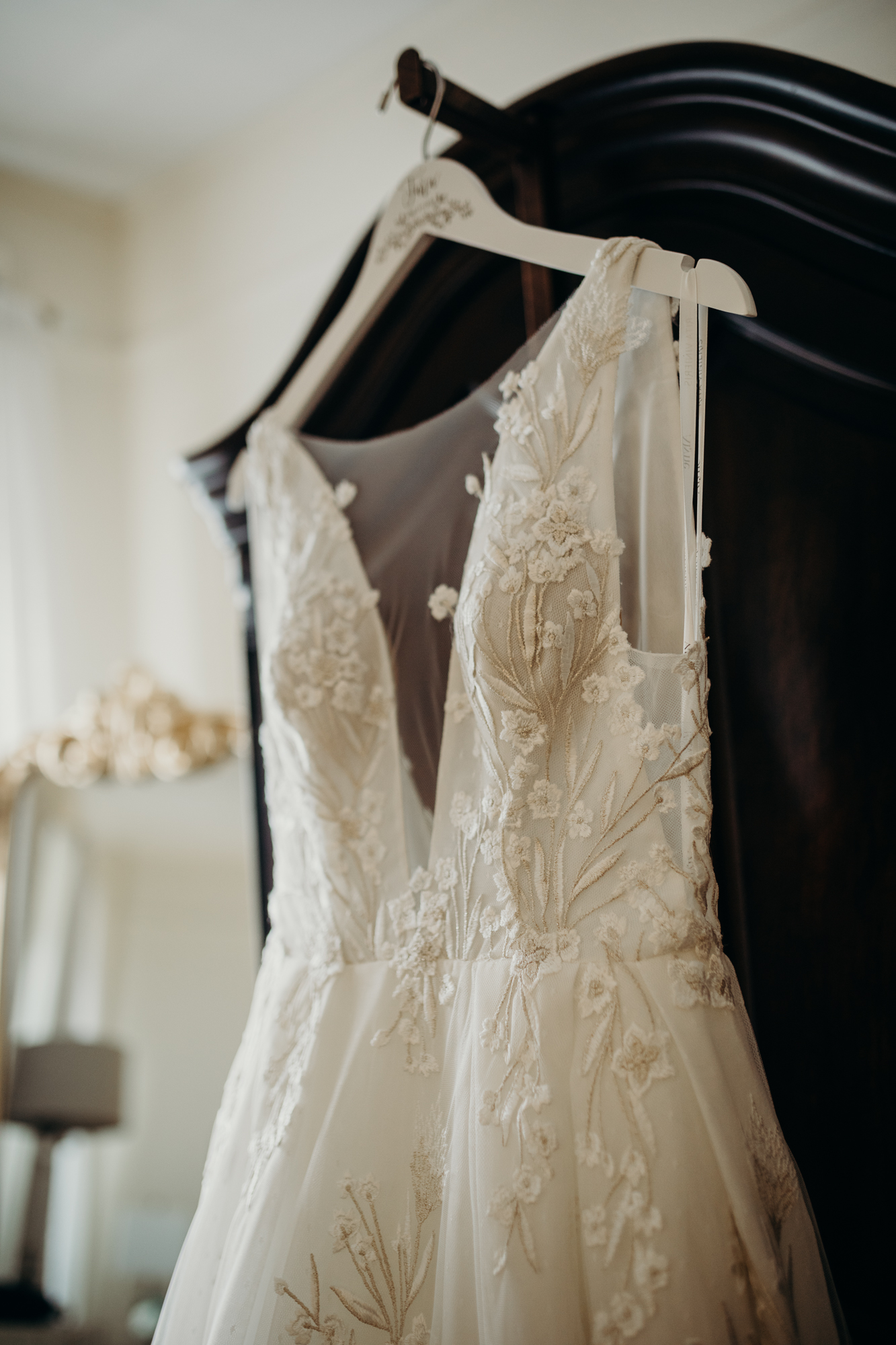 a wedding gown hanging at liberty warehouse in brooklyn, new york city