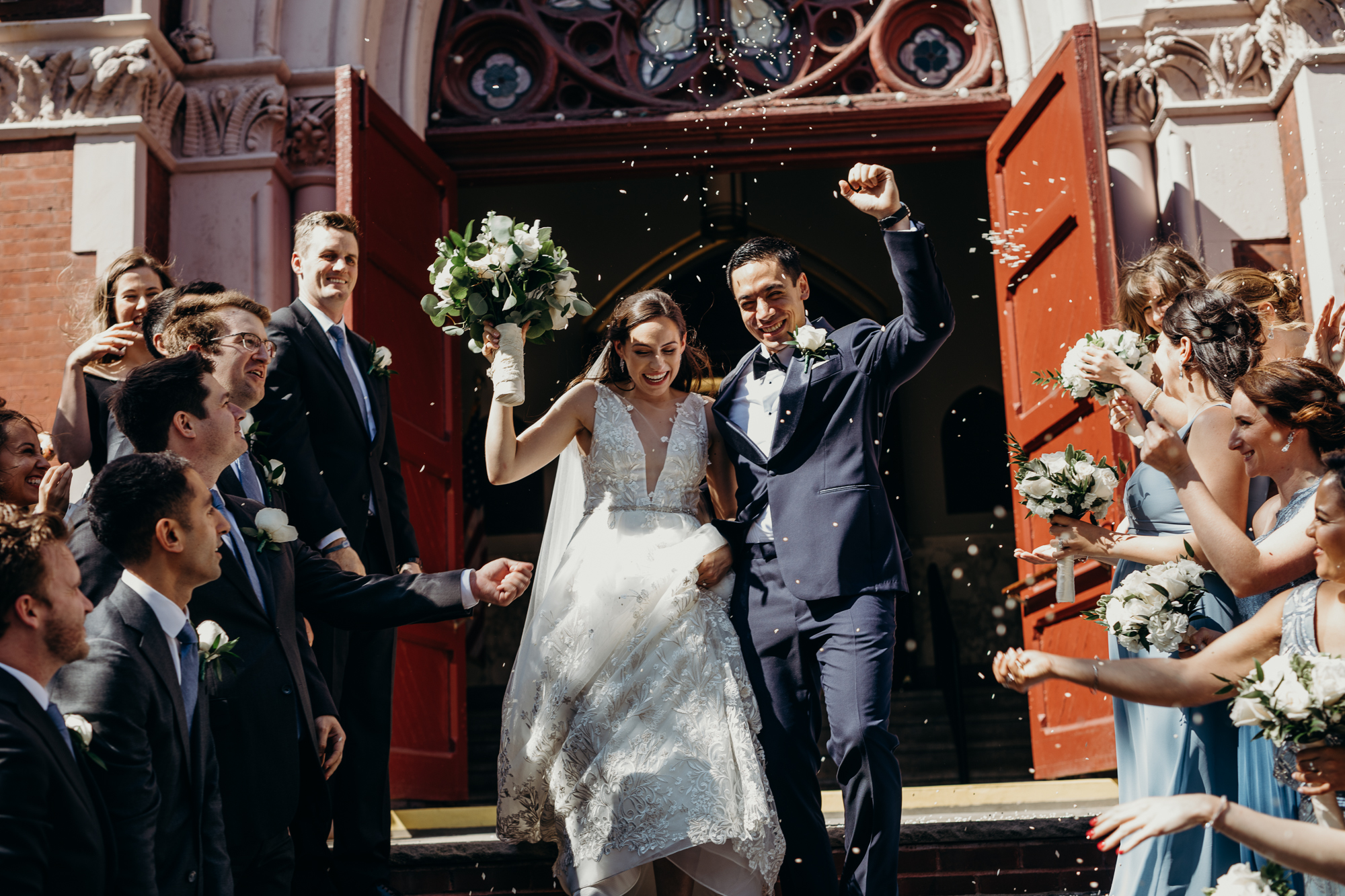 a bride and groom exit their wedding ceremony at a church in bay ridge, brookyn