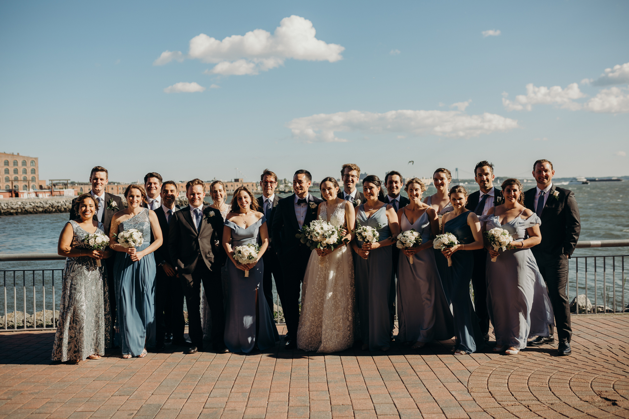 a portrait of a wedding party at liberty warehouse in brooklyn, new york city