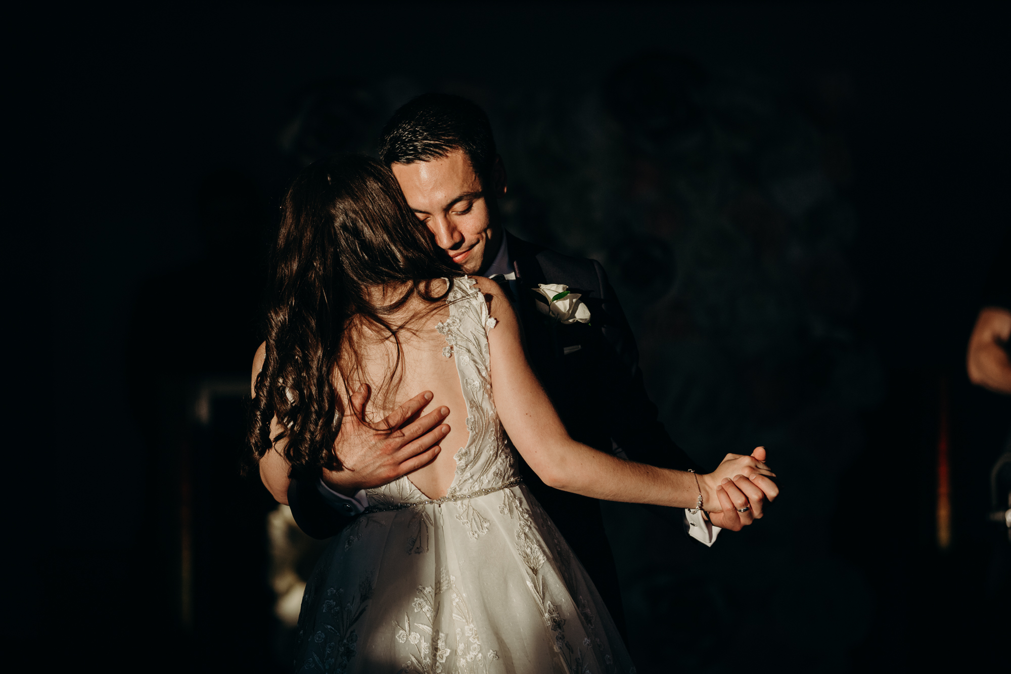 a bride and groom during their first dance at liberty warehouse in brooklyn, new york city