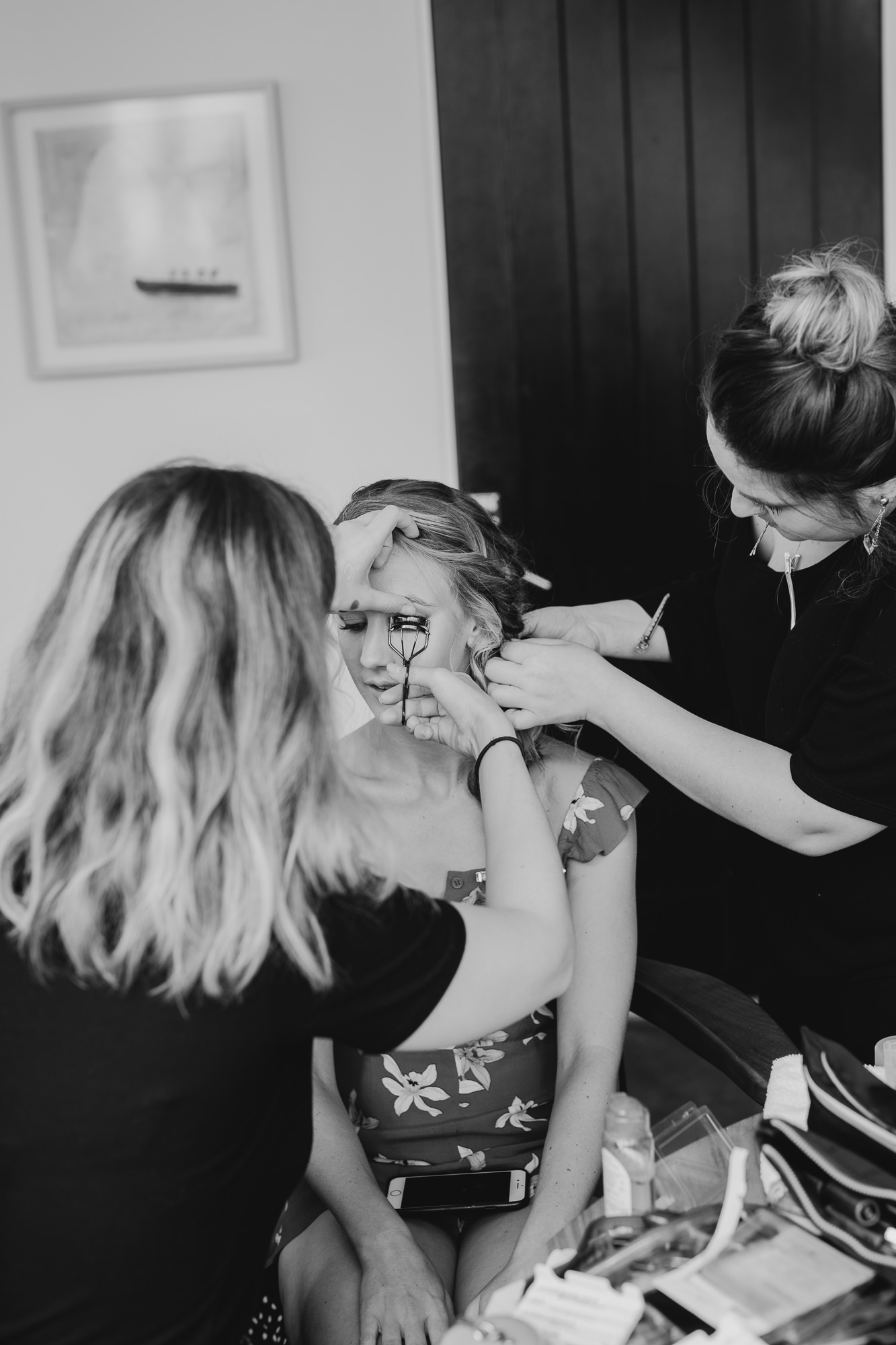 a bride having hair and makeup done at the wythe hotel in brooklyn, new york city