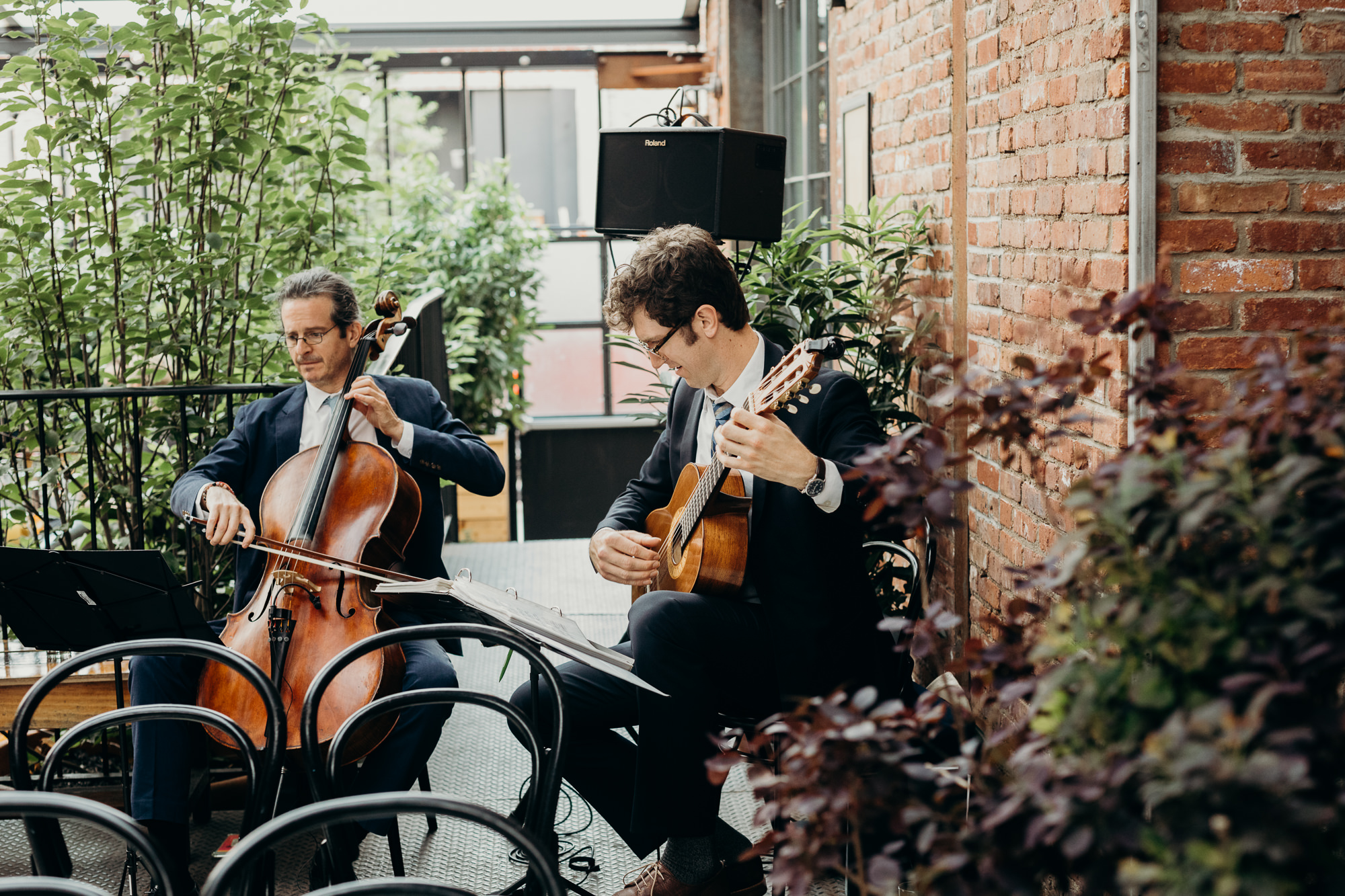 musicians play for the wedding ceremony at the wythe hotel in brooklyn, new york city