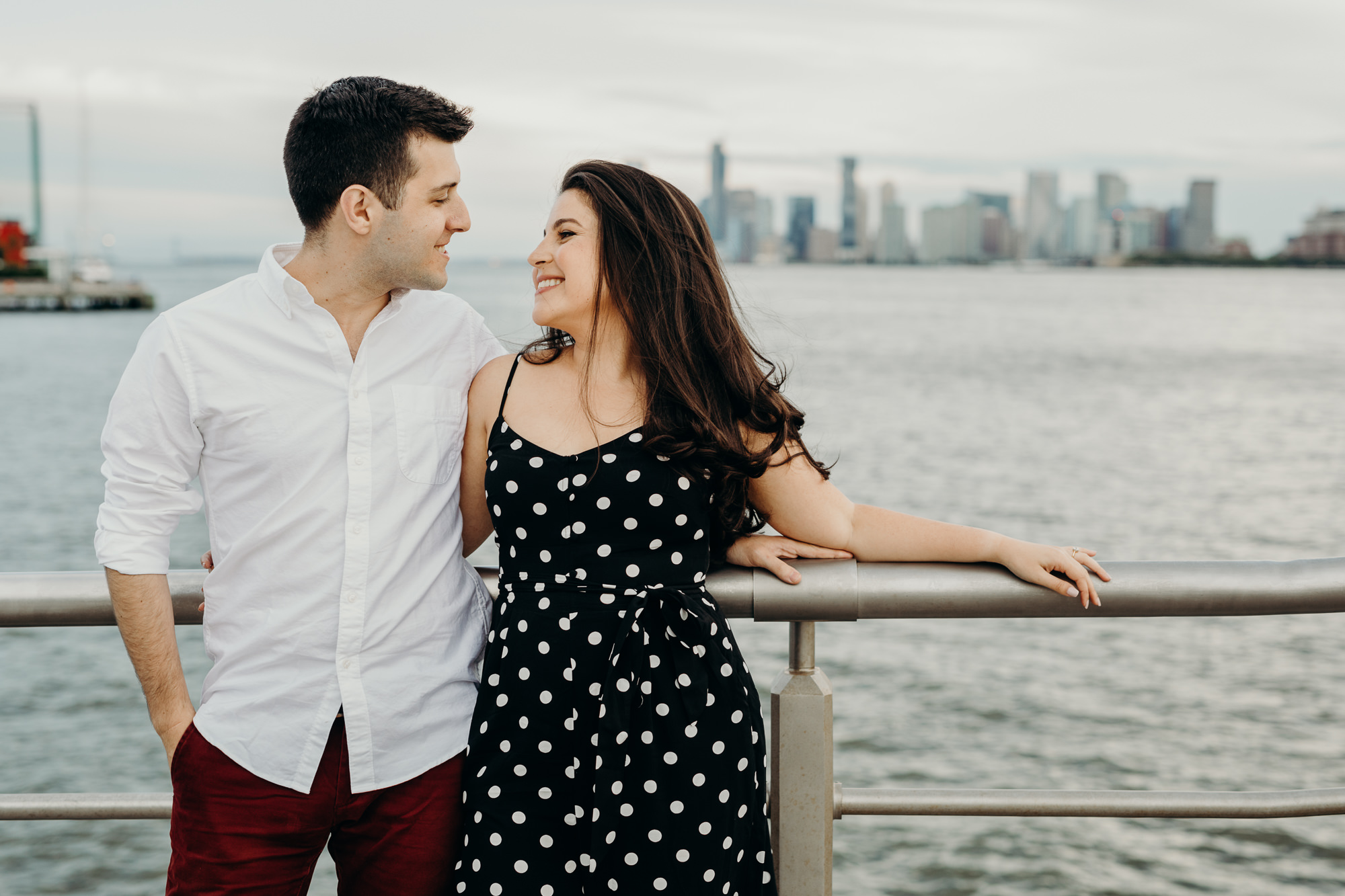a portrait of a couple at the waterfront in chelsea, new york city