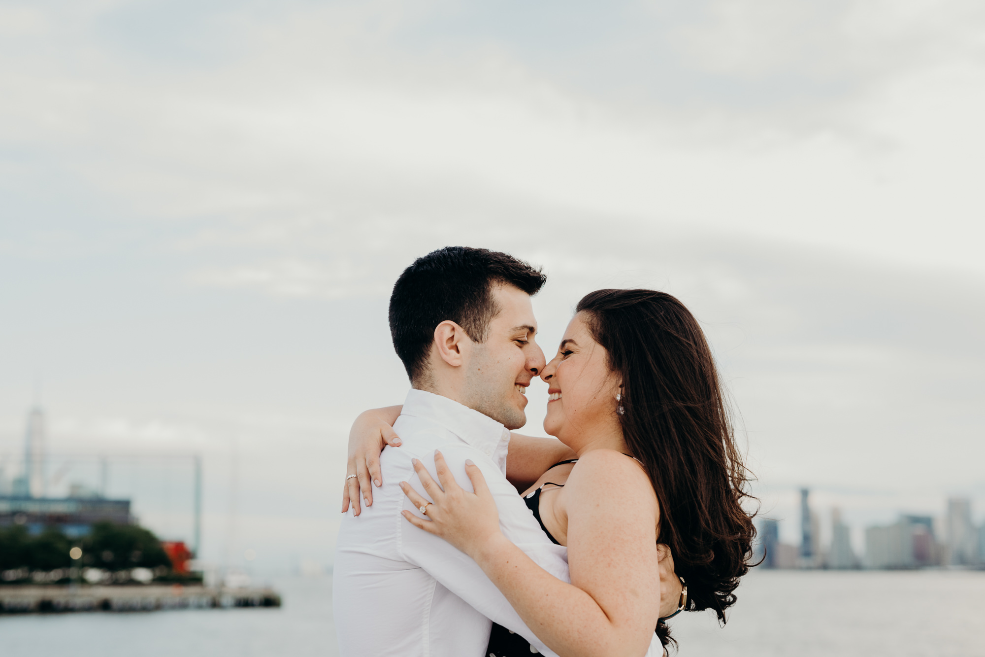 a portrait of a couple at the waterfront in chelsea, new york city