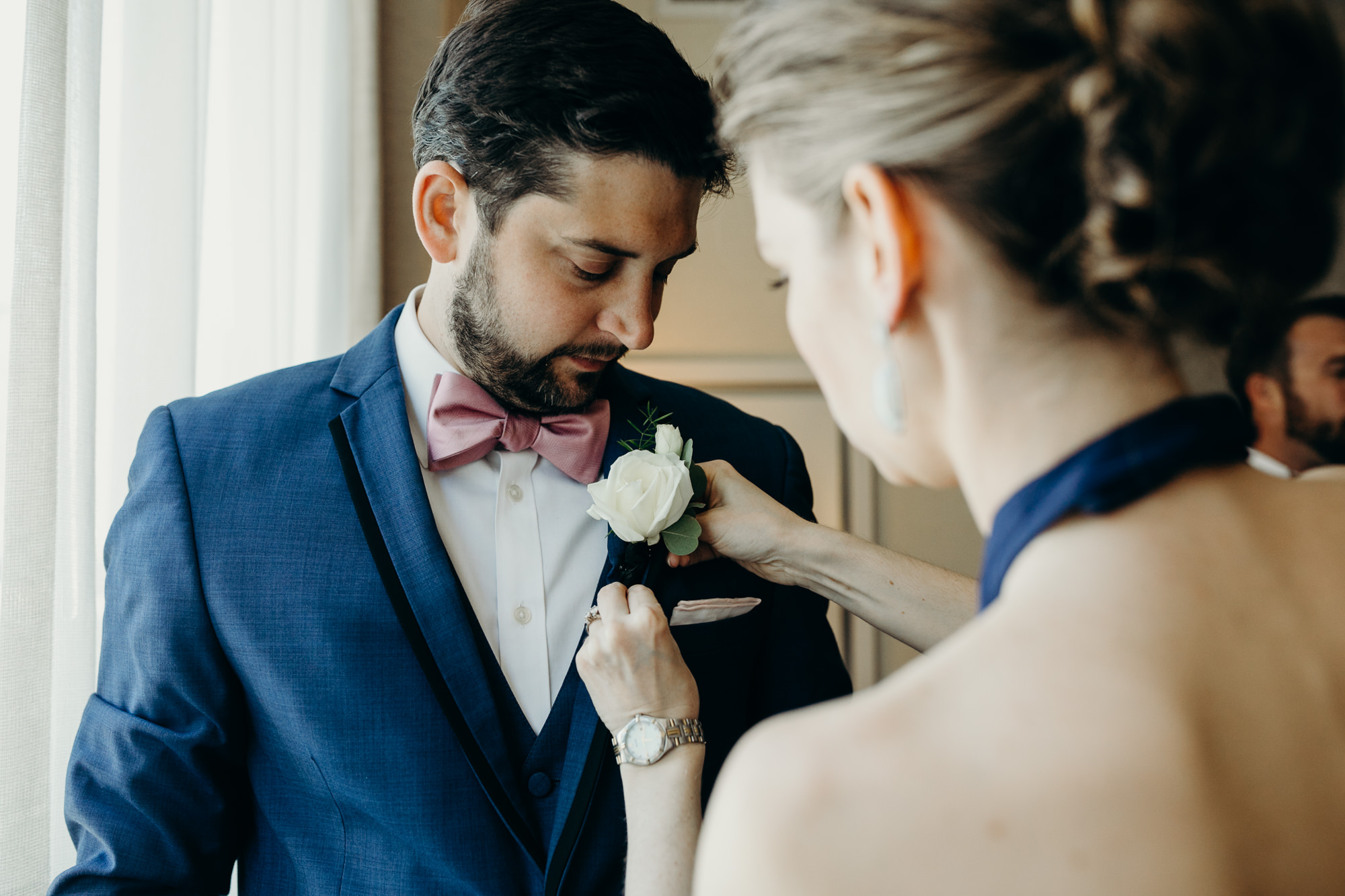 a groom getting ready for his wedding at city winery in new york city, new york