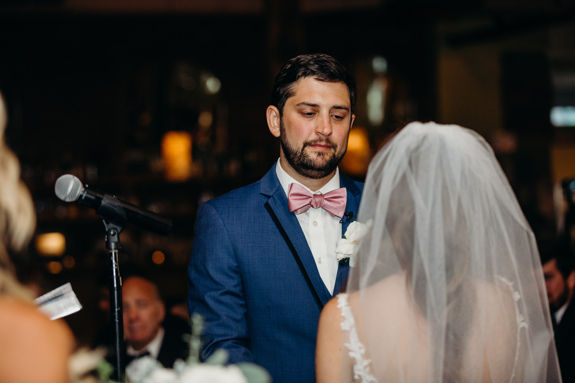 a groom during his wedding ceremony at city winery in new york city, new york