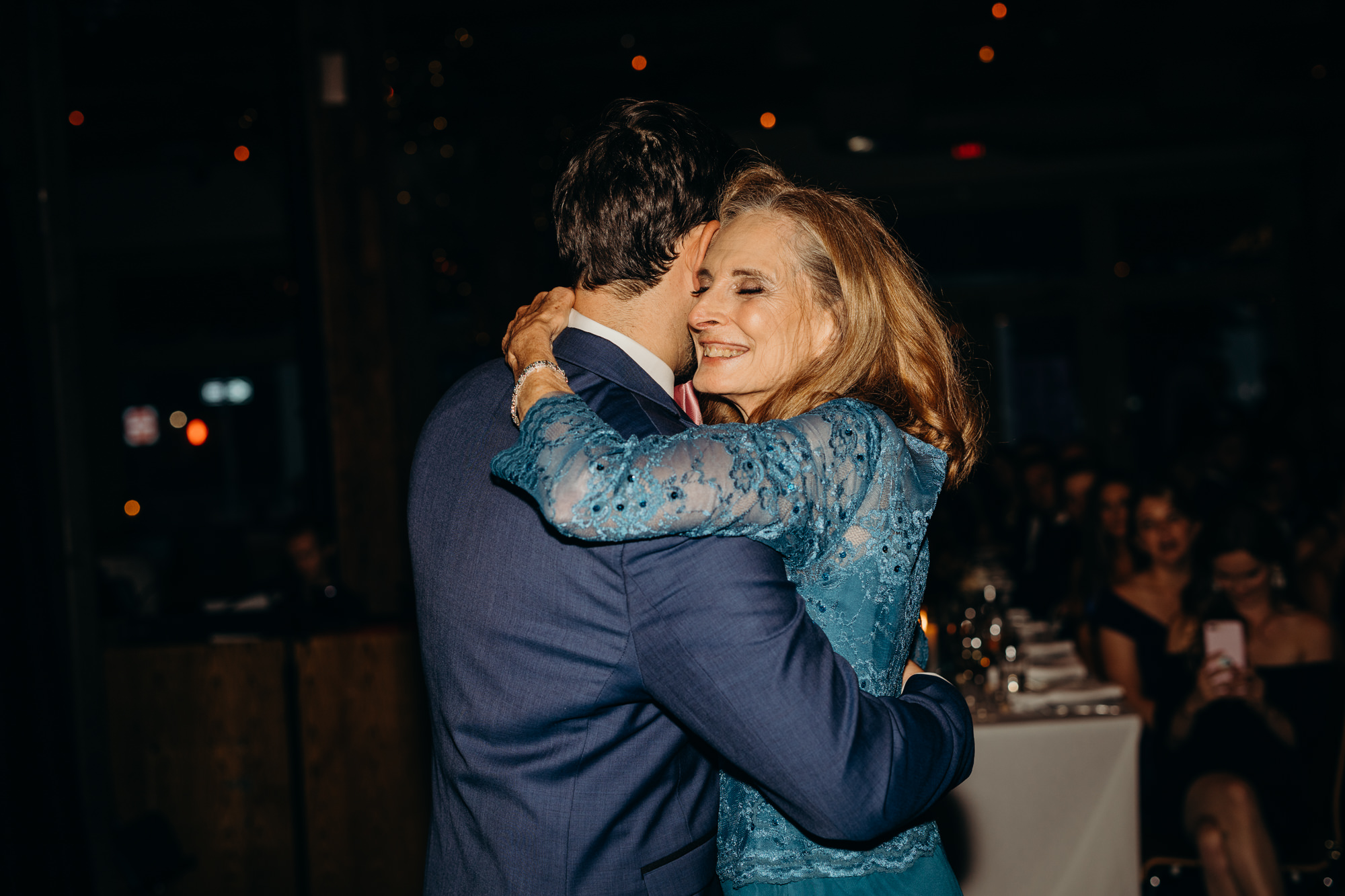 a groom during his mother son dance at city winery in new york city, new york