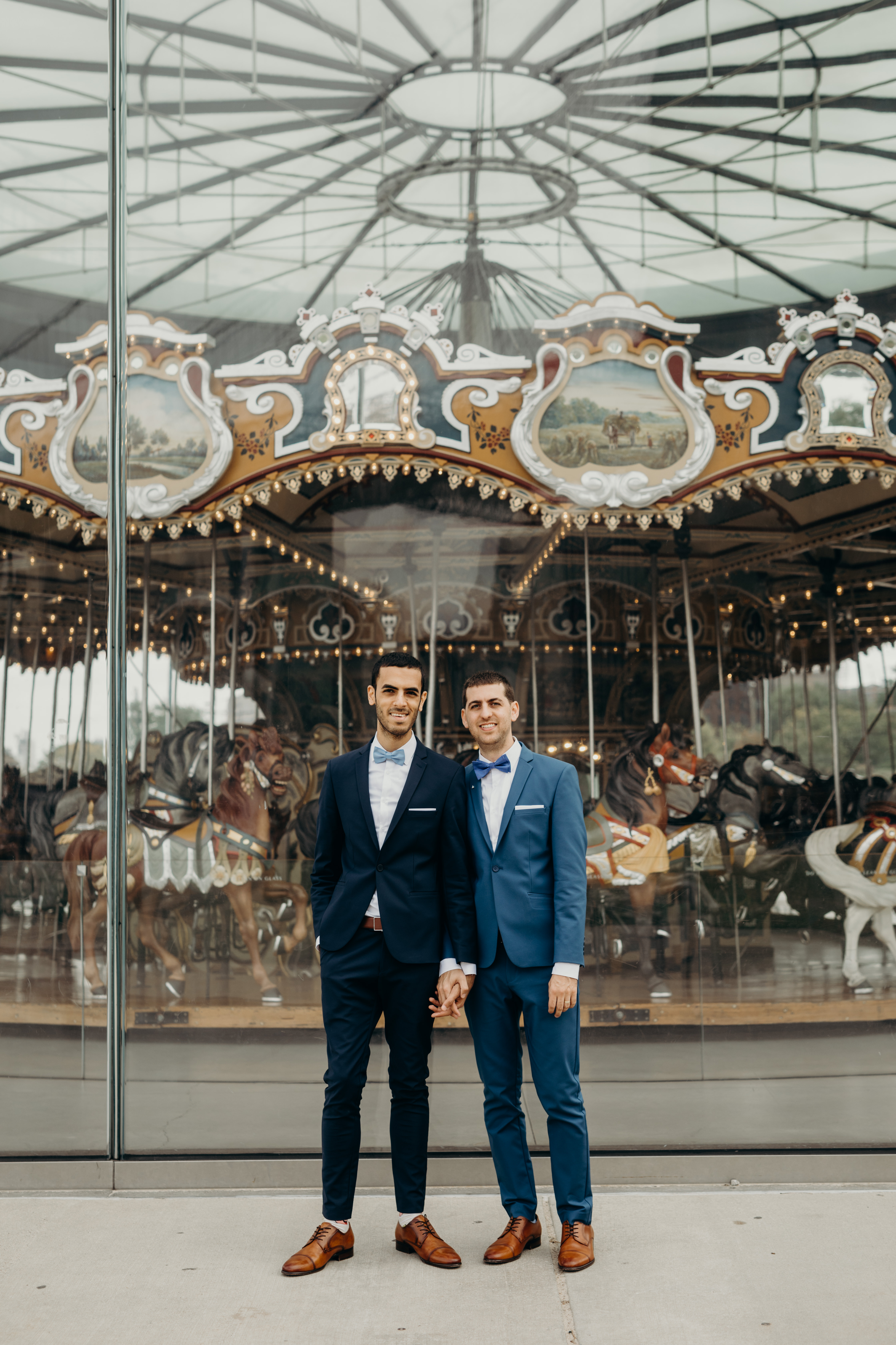 wedding portraits with grooms at brooklyn bridge park in dumbo, brooklyn