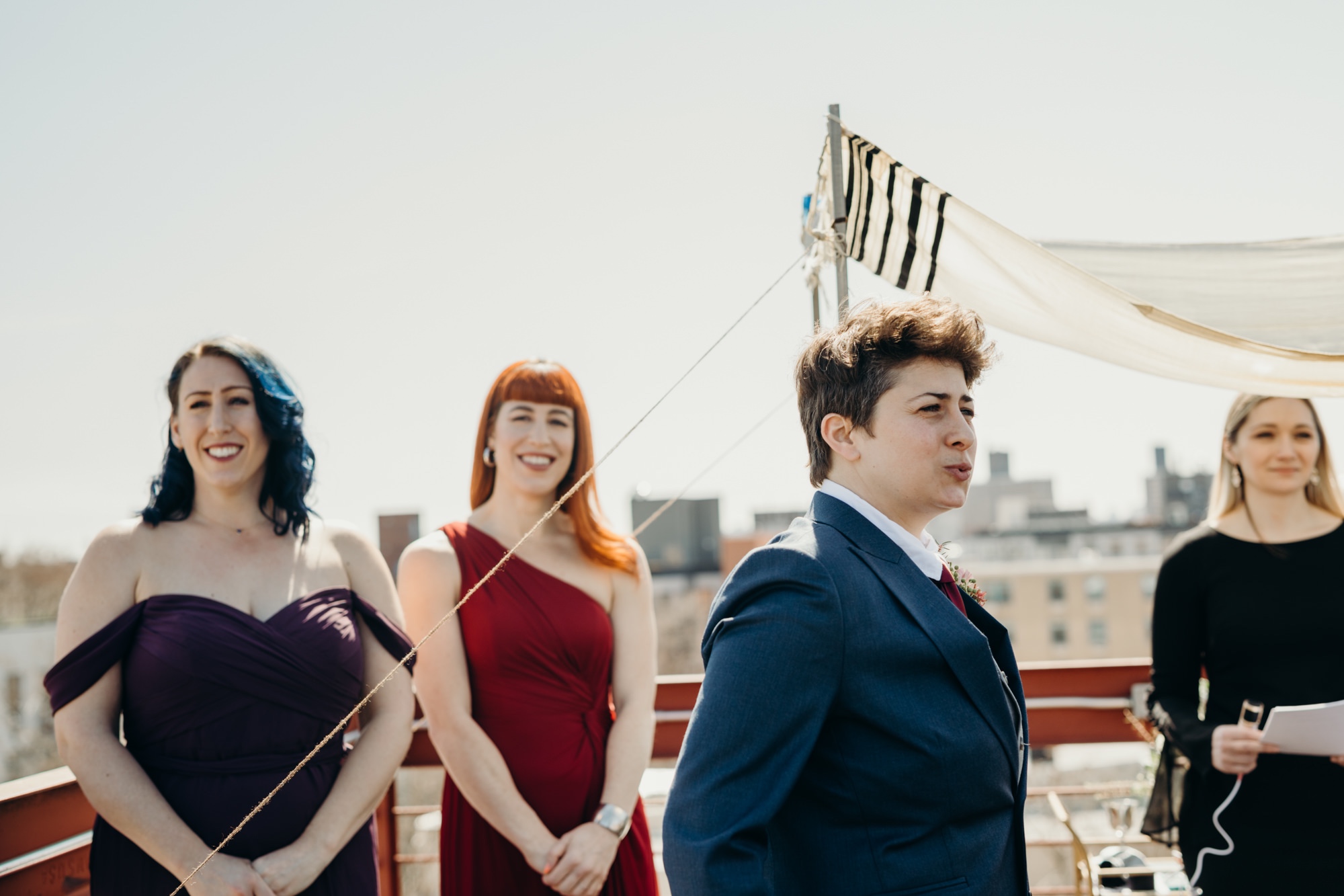 a couple during their wedding ceremony in bushwick,brooklyn