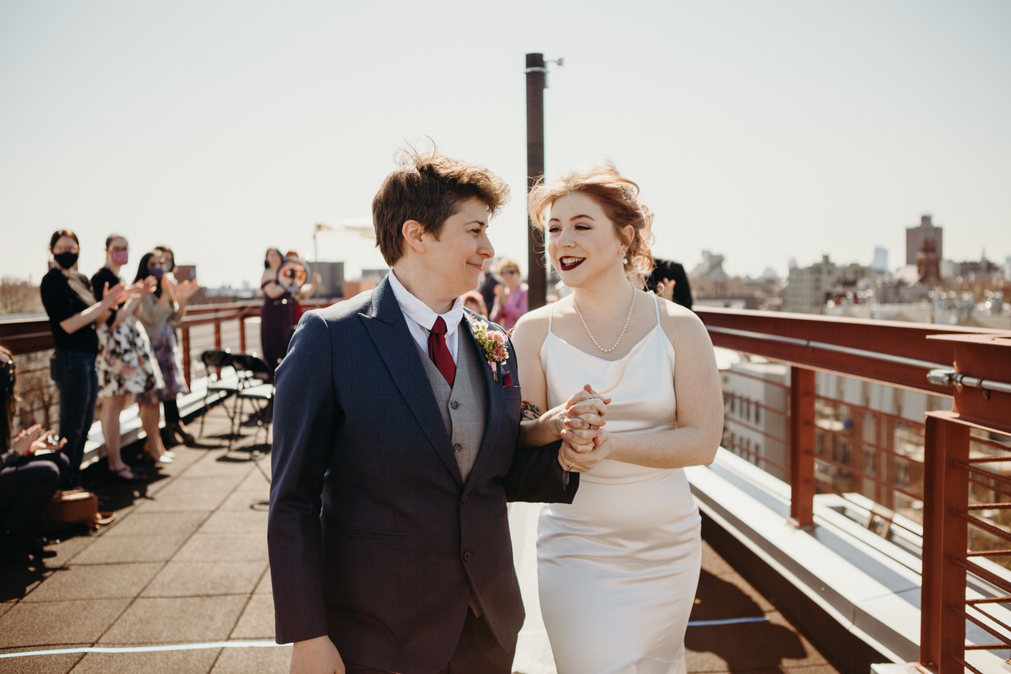 a couple celebrating after their wedding ceremony in bushwick, brooklyn