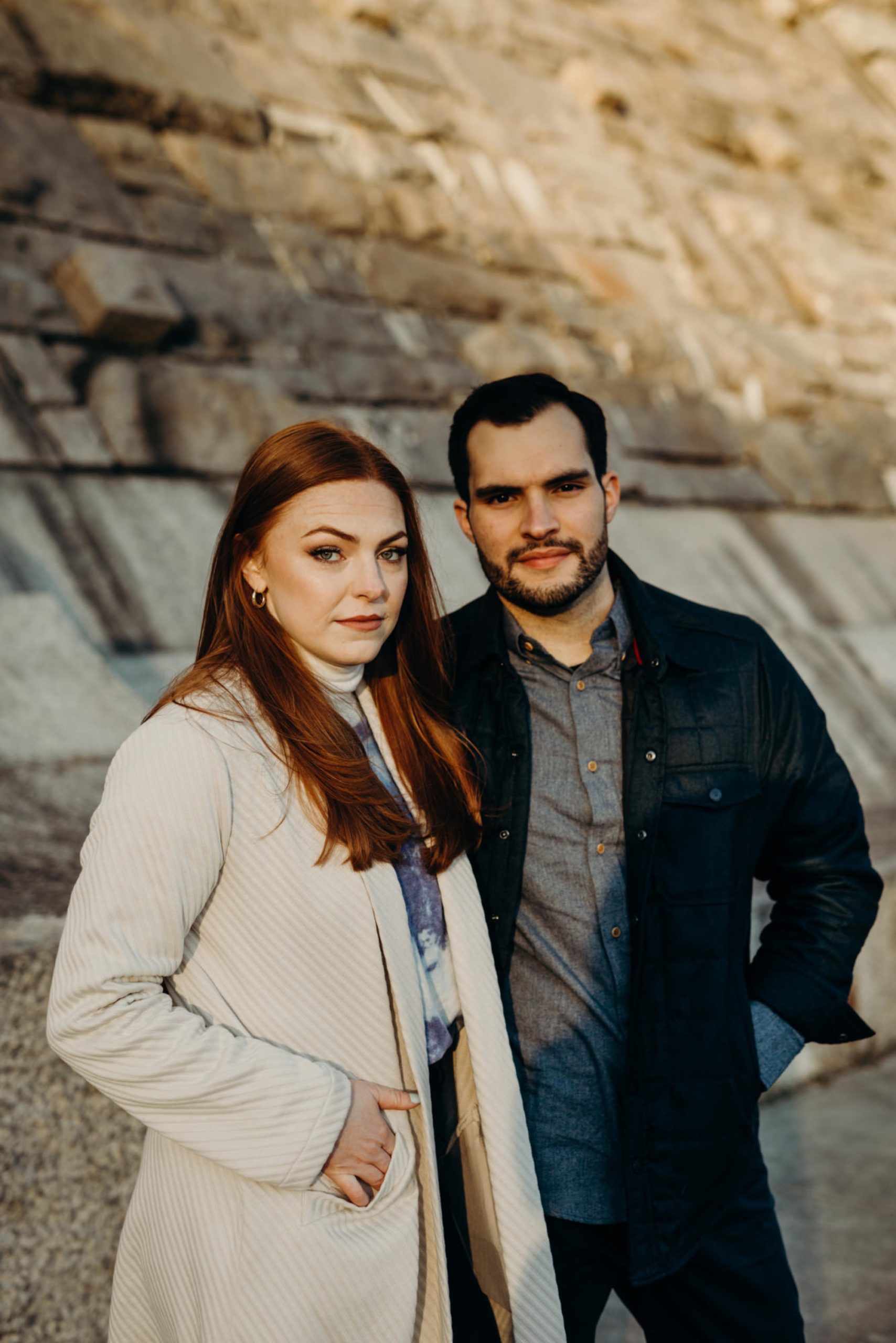 a engagement portrait of a couple at the kensico dam in white plains, new york