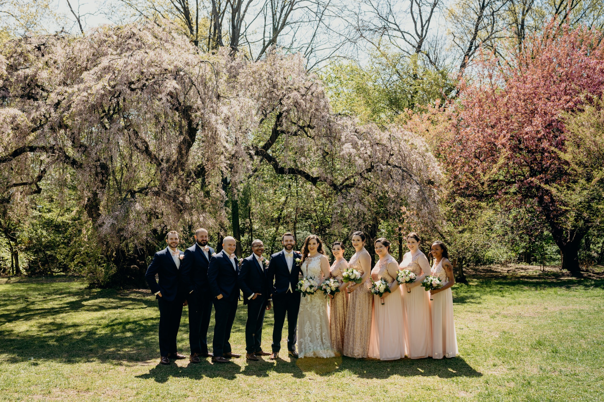 portrait of a bridal party at a park in new jersey during spring