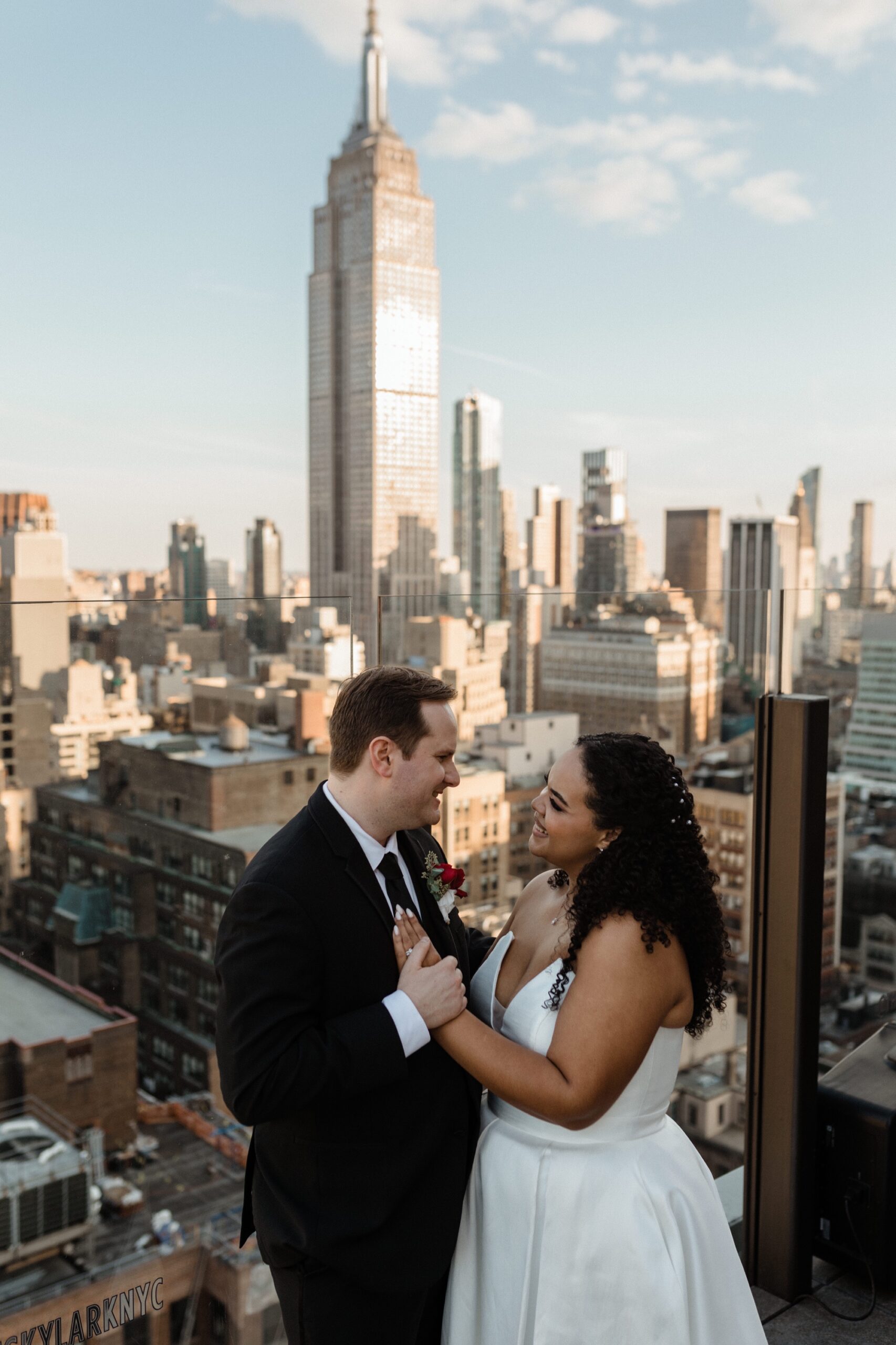 editorial wedding photo against nyc skyline during golden hour
