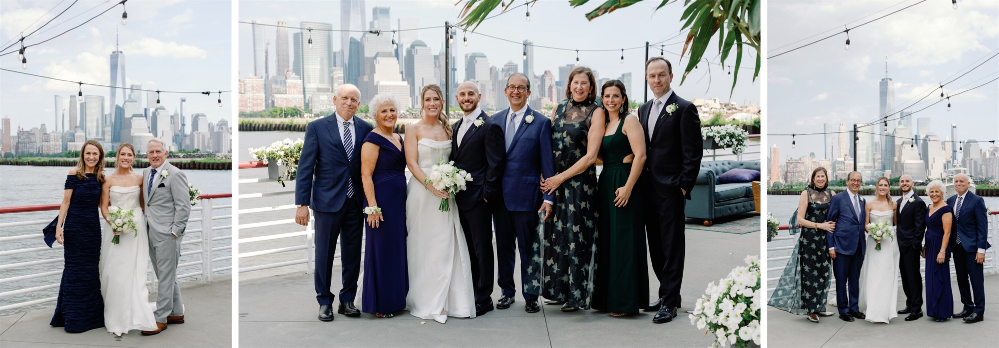 The bride and groom pose with family members on a waterfront deck at Battello, with the Manhattan skyline and One World Trade Center in the background.